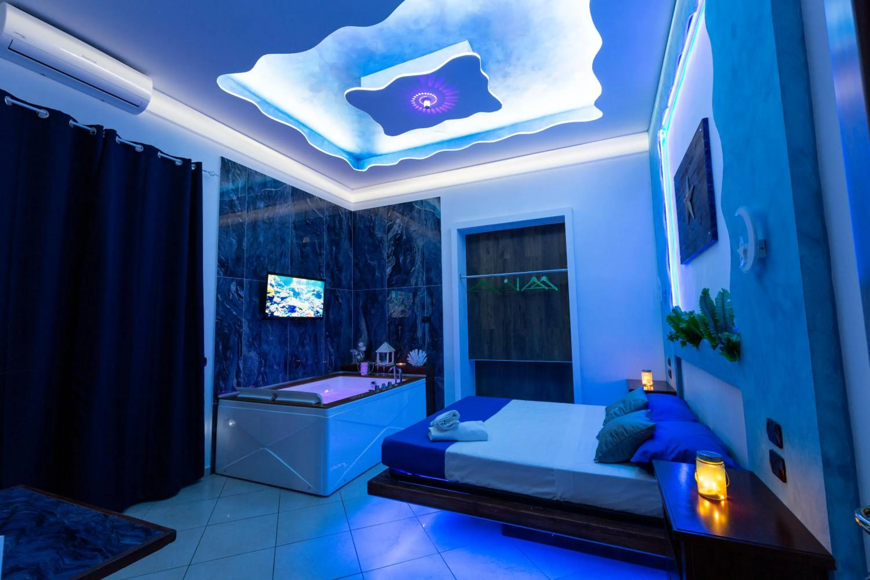Bed in Pompei Luxury Rooms