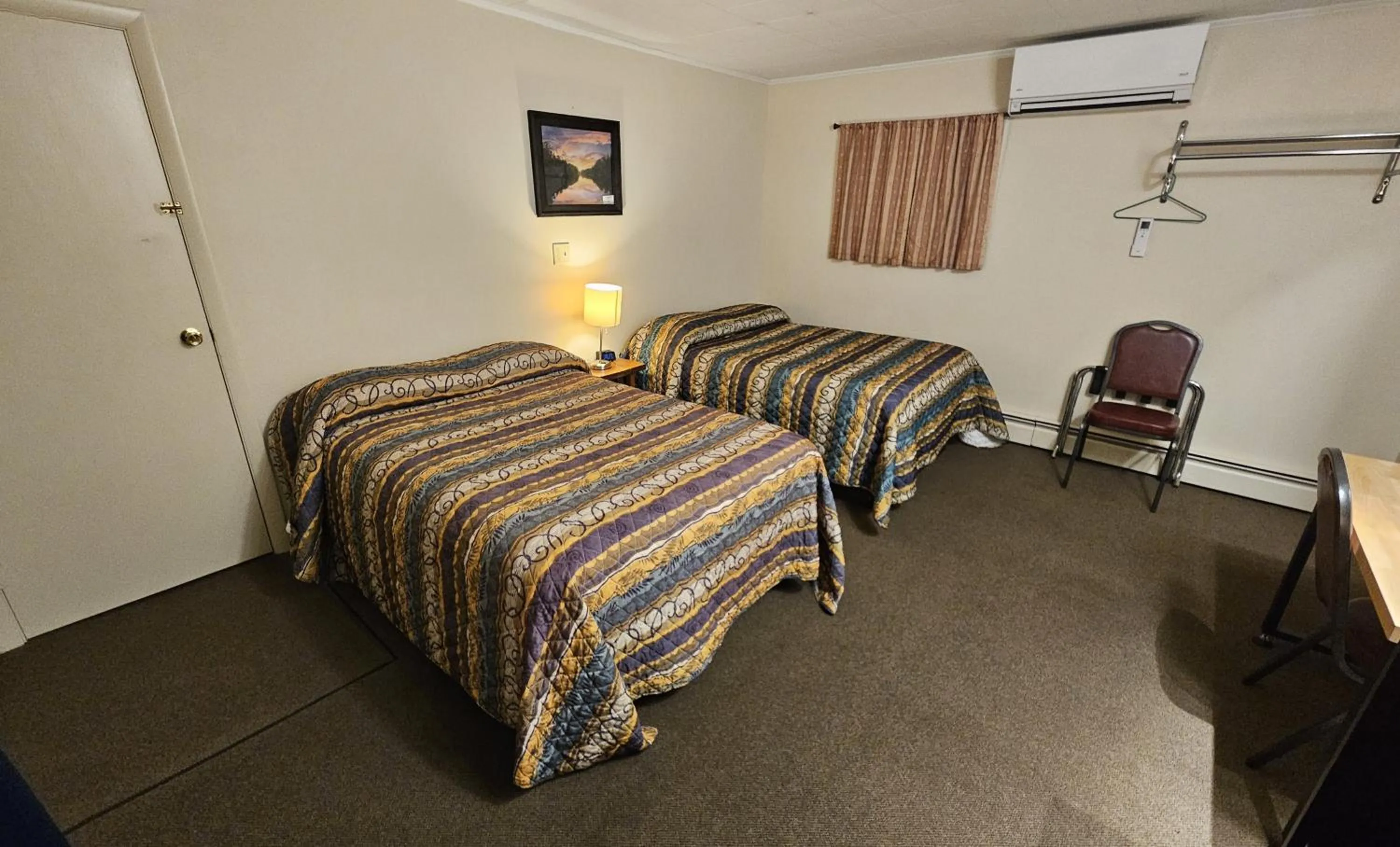 Bed in The Brookside Inn