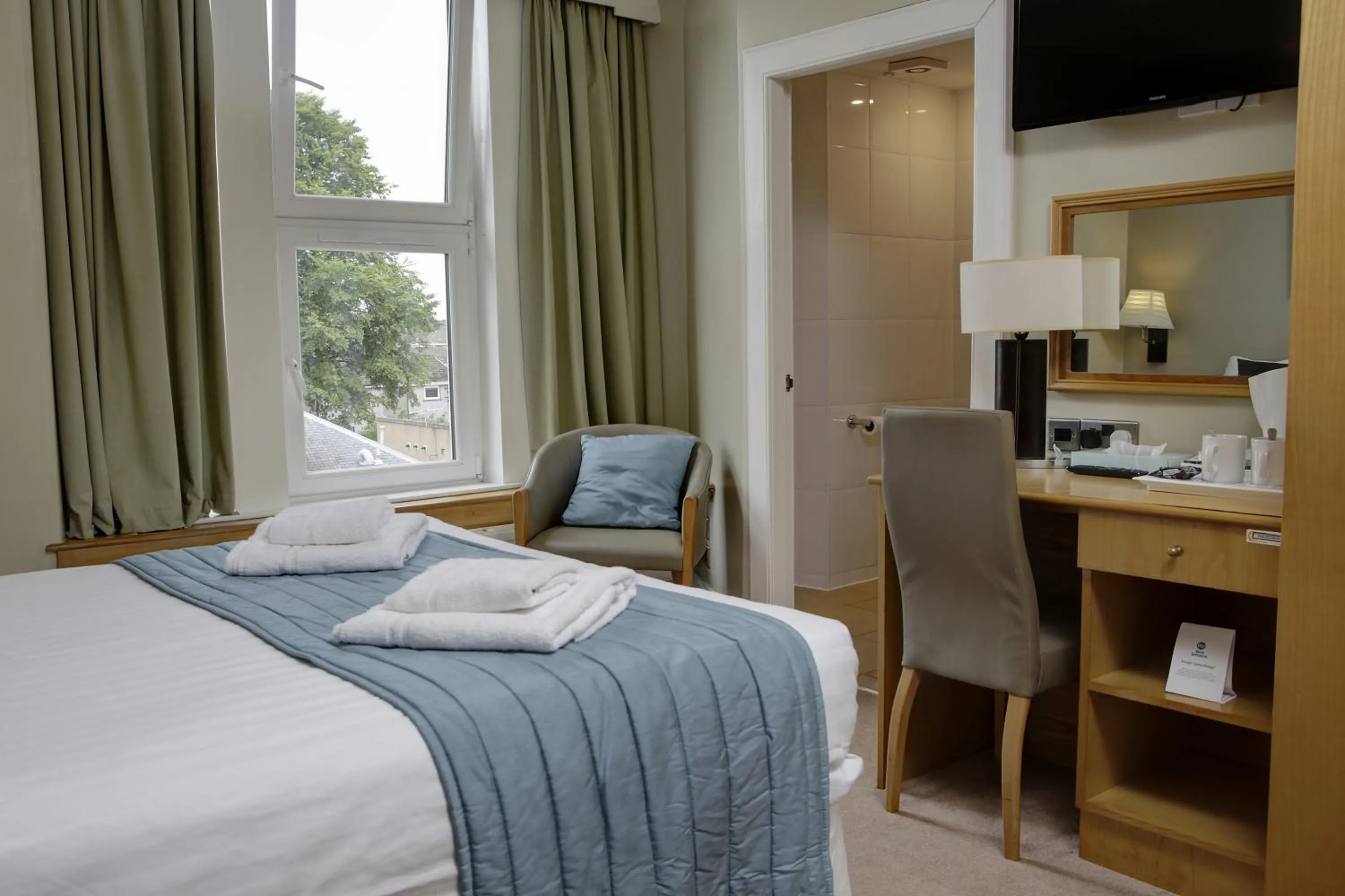 Bed in Woodlands Hotel, BW Signature Collection