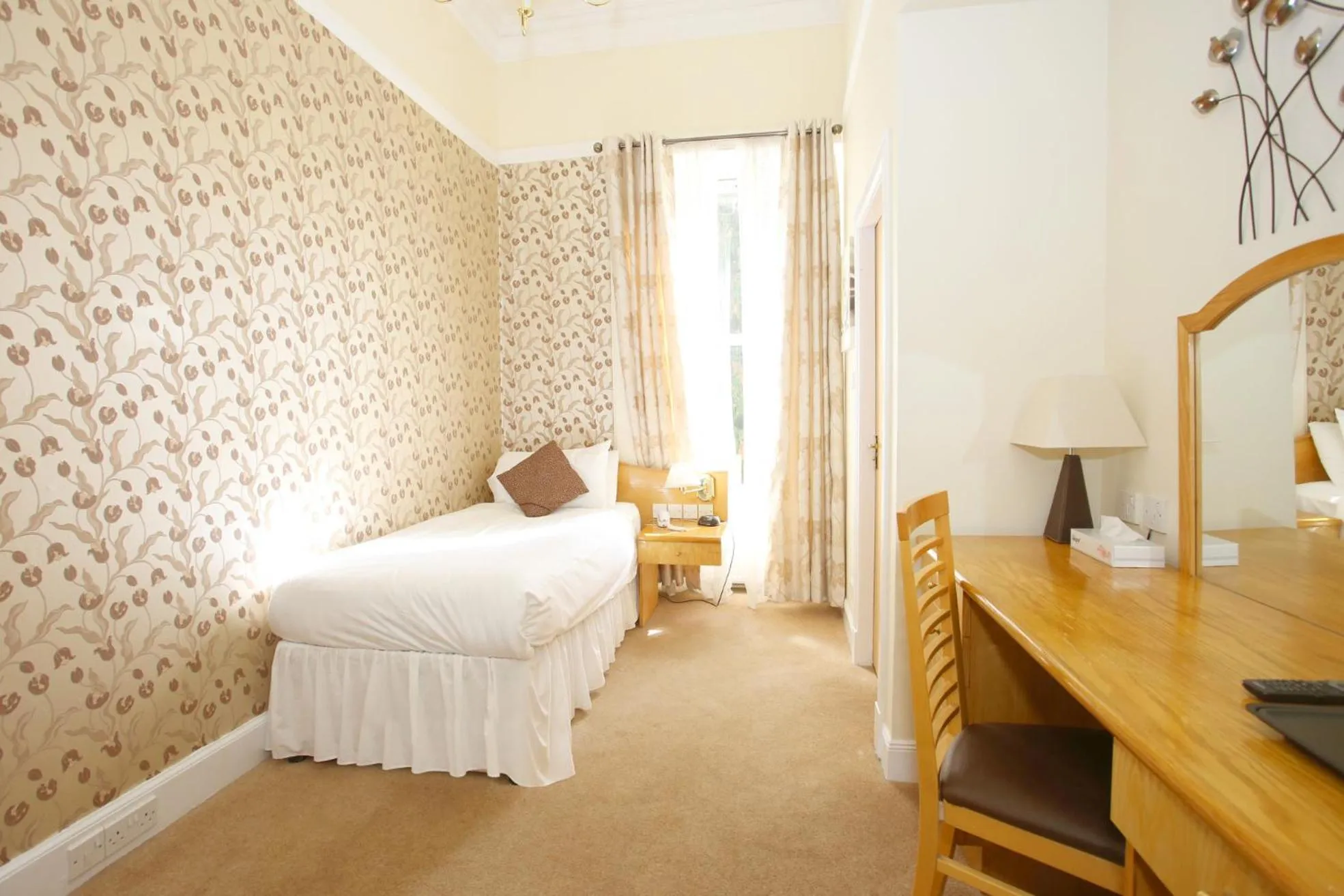 Bed in Woodlands Hotel, BW Signature Collection