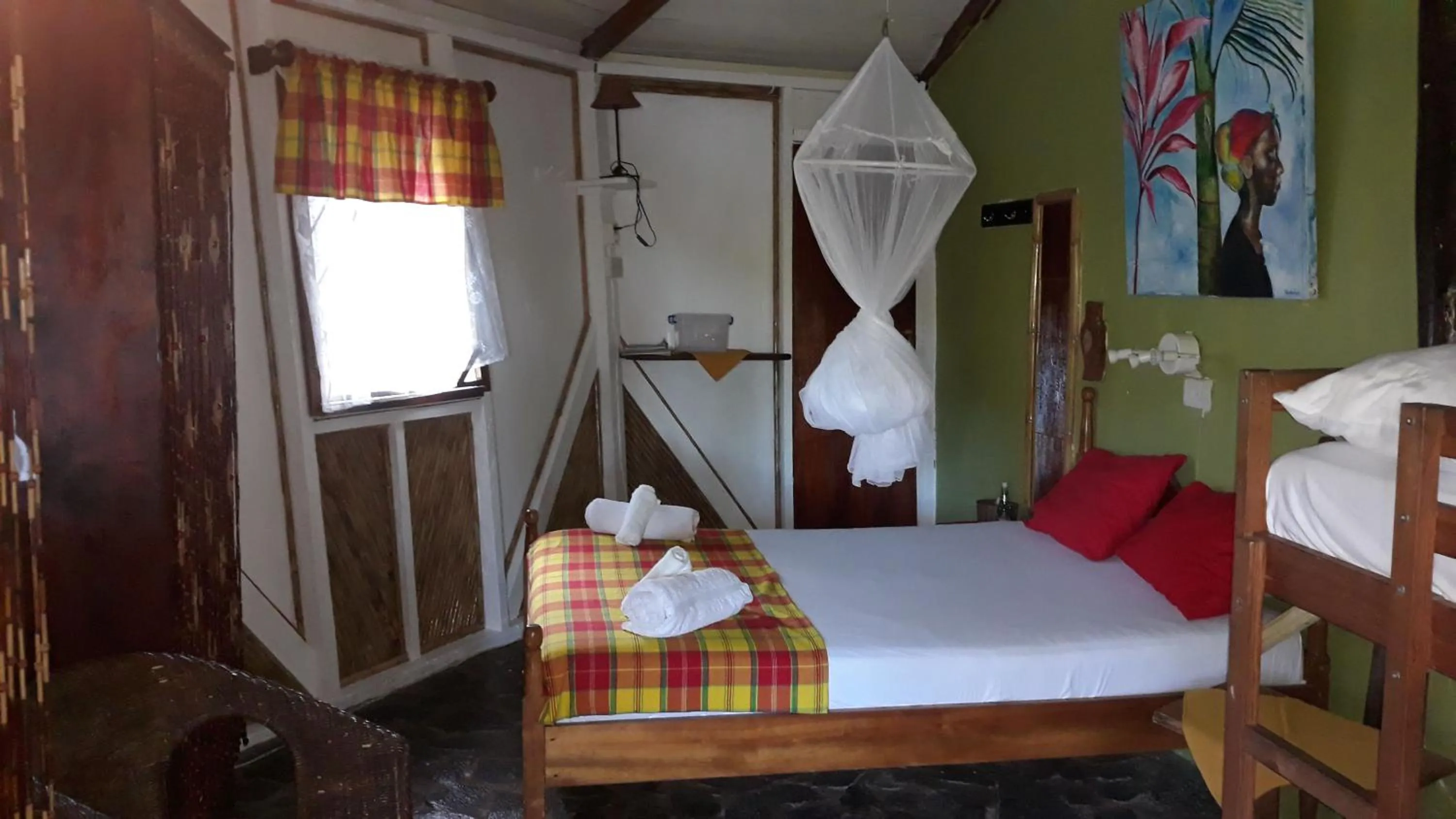 Bed in Hibiscus Valley Inn