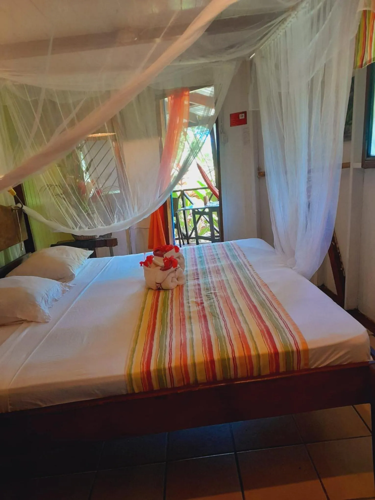 Bed in Hibiscus Valley Inn