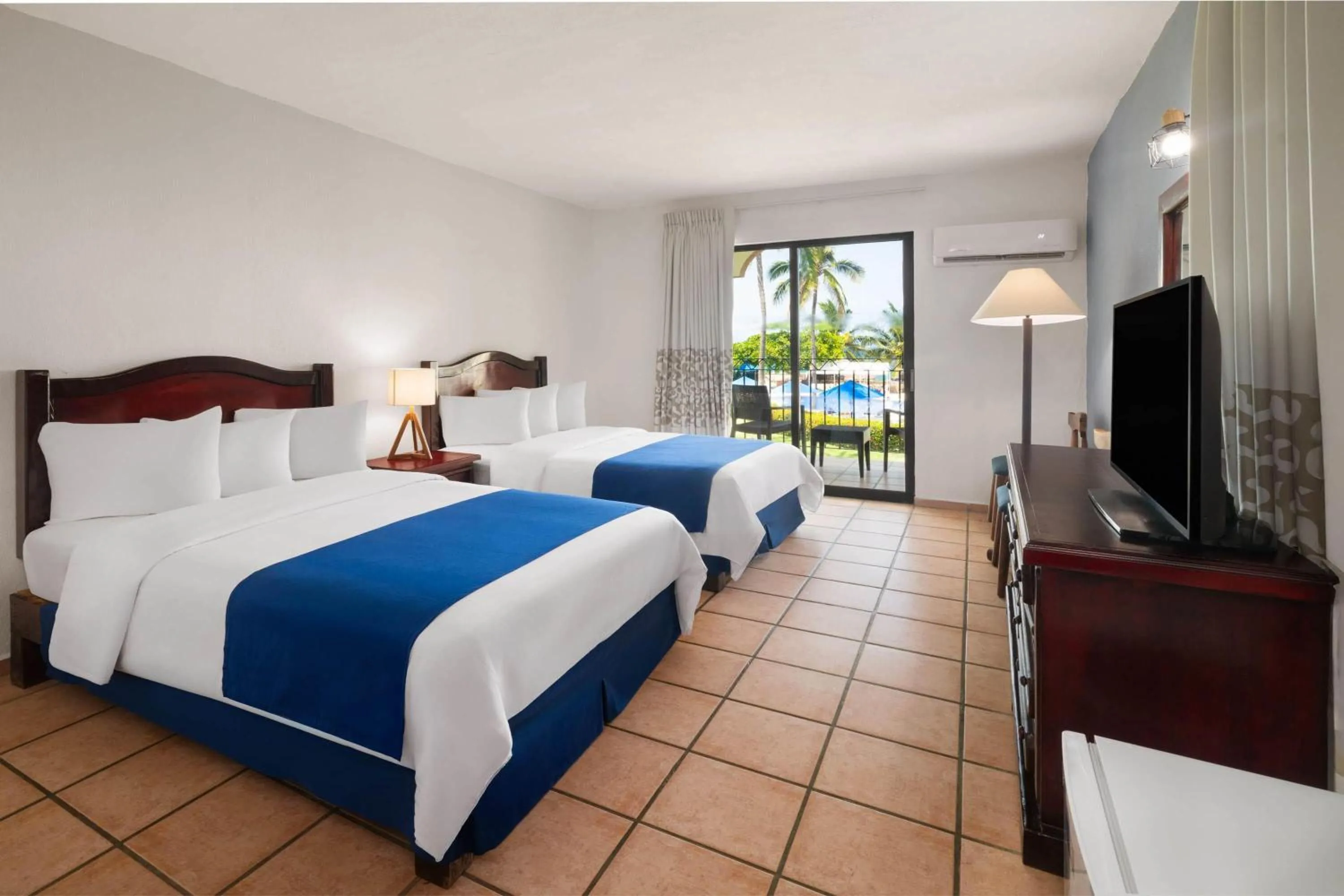 Photo of the whole room, Bed in Grand Decameron Complex Bucerias, A Trademark All-Inclusive Resort
