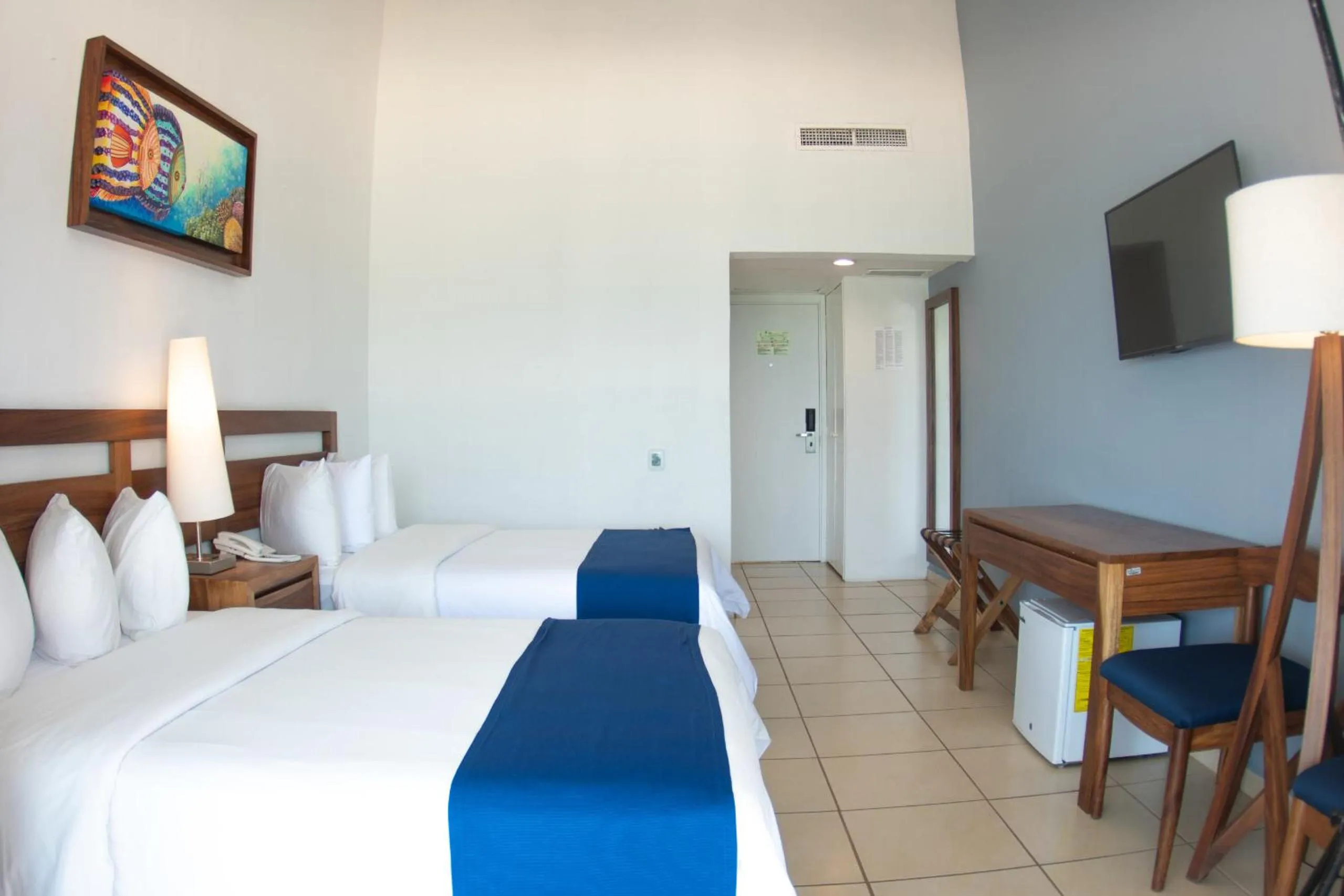 Photo of the whole room, Bed in Grand Decameron Complex Bucerias, A Trademark All-Inclusive Resort