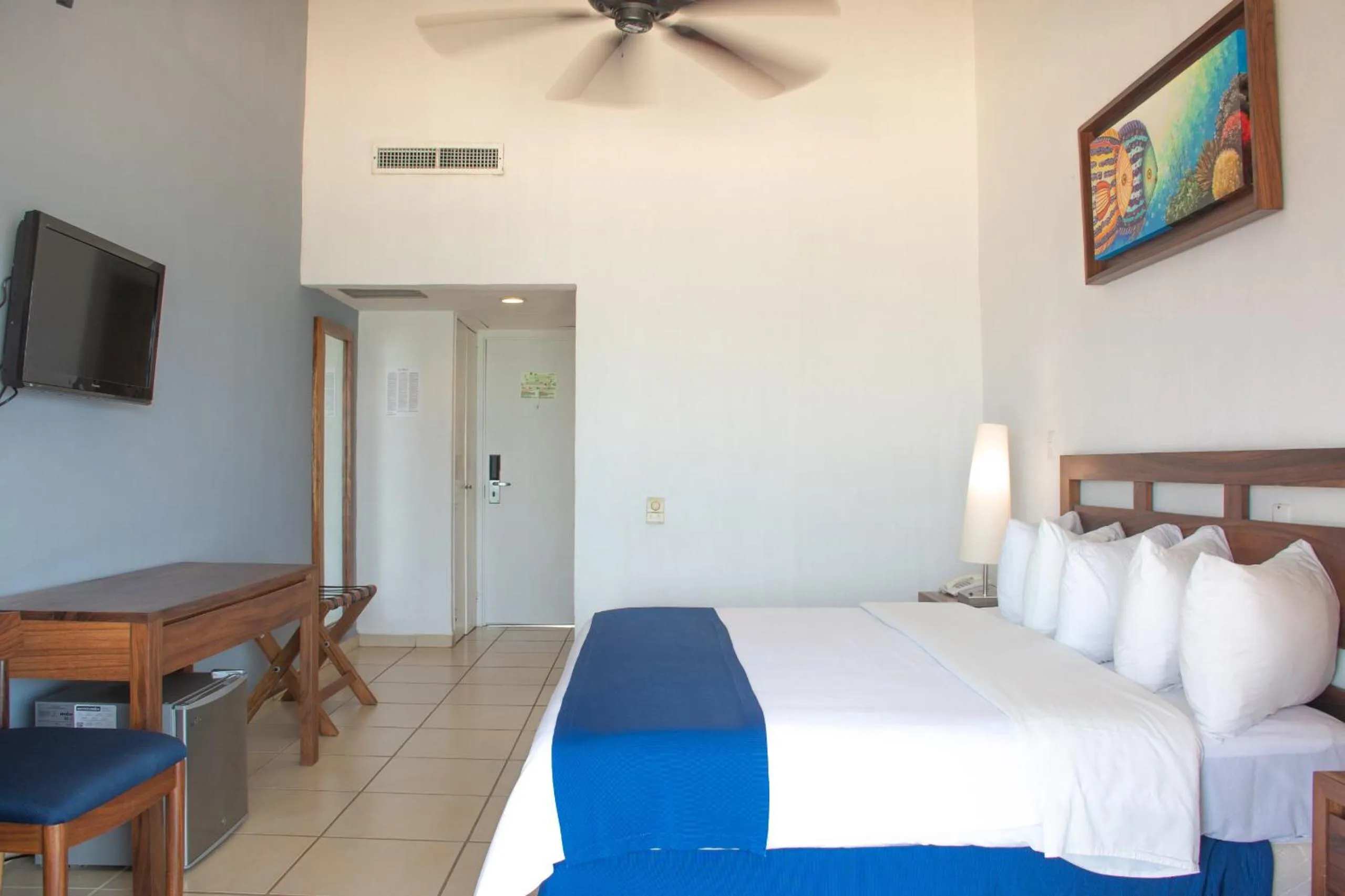 Photo of the whole room, Bed in Grand Decameron Complex Bucerias, A Trademark All-Inclusive Resort