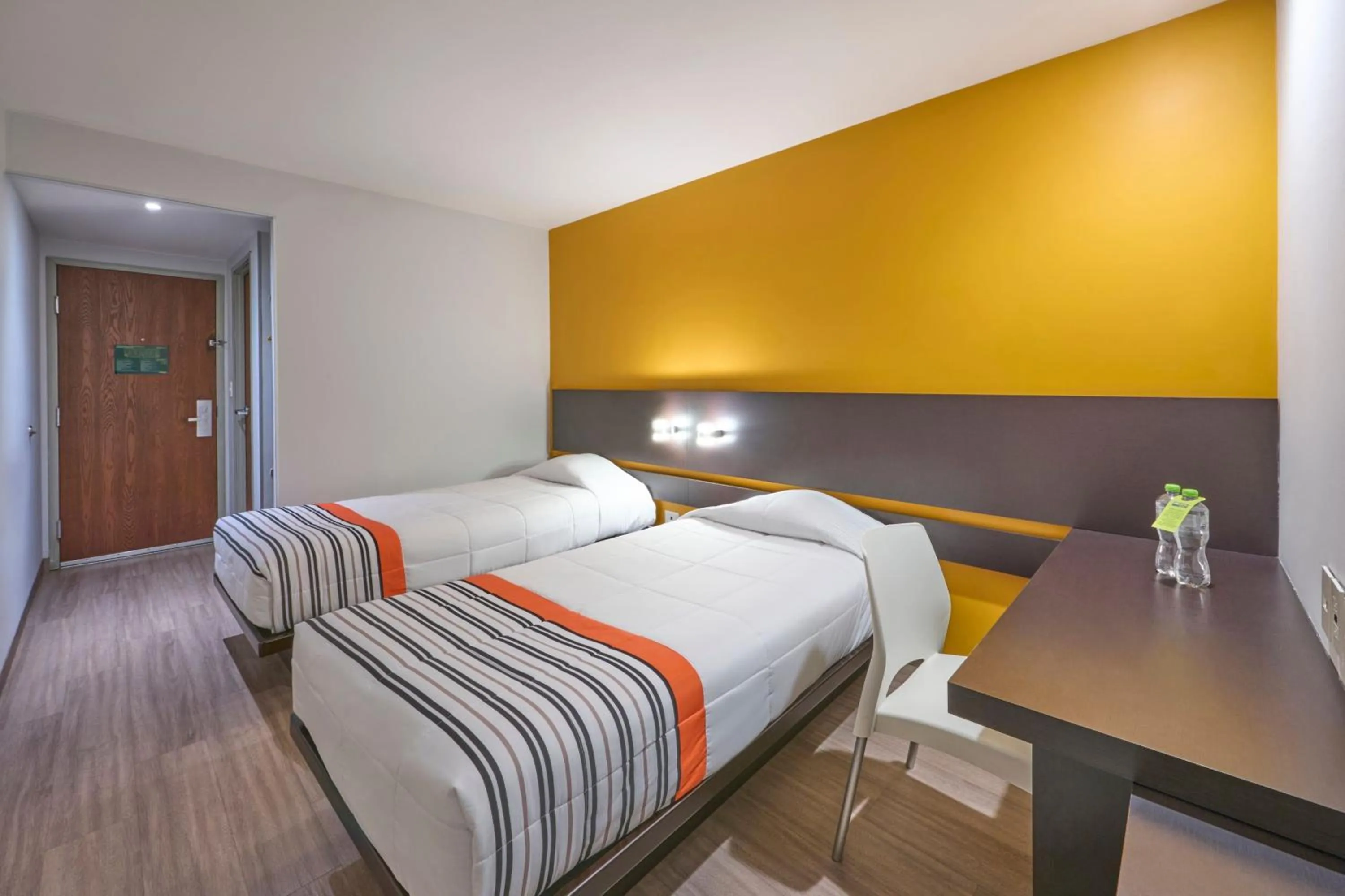 Bedroom, Bed in City Express Junior by Marriott Mexicali