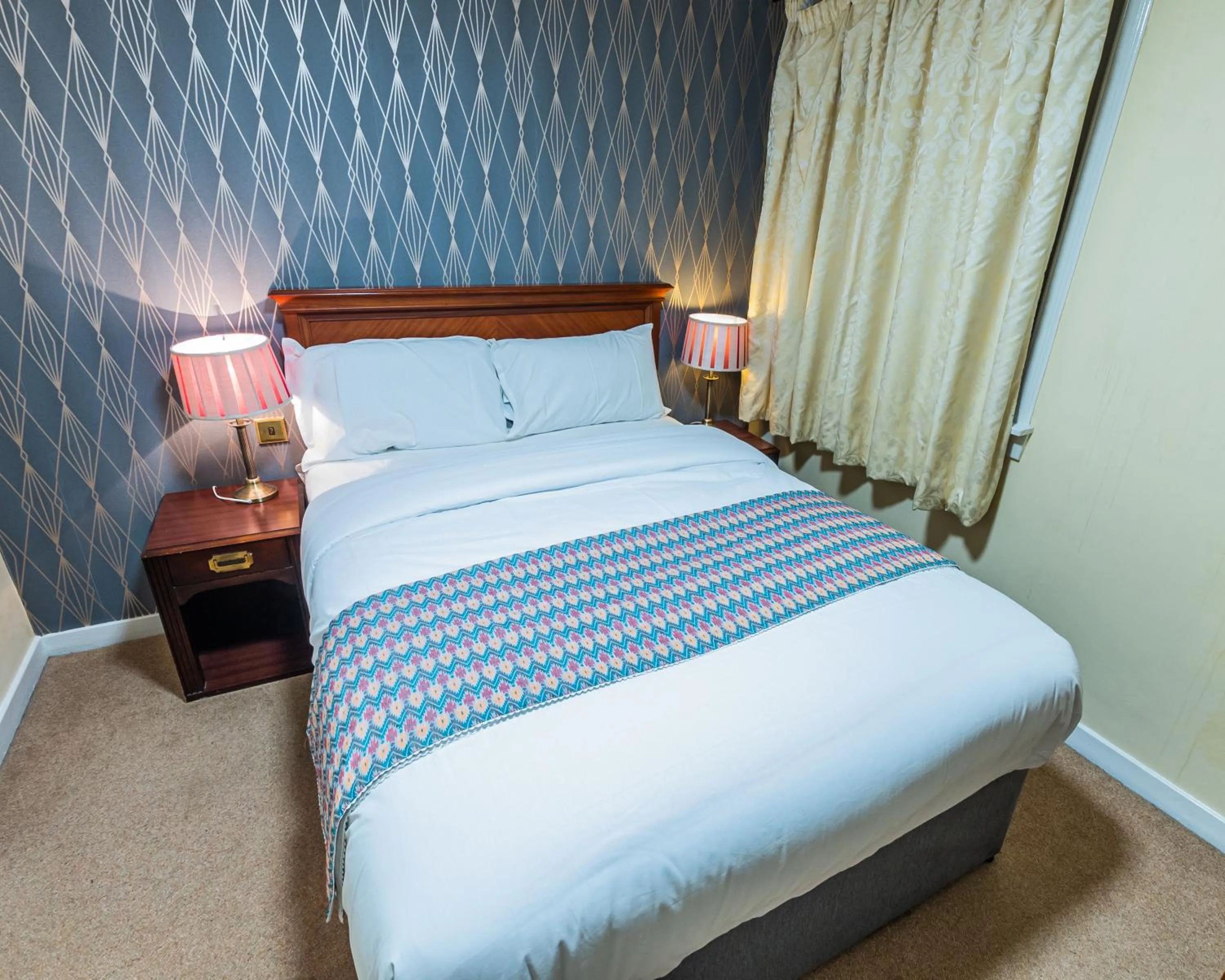 Bed in Grampian Hotel