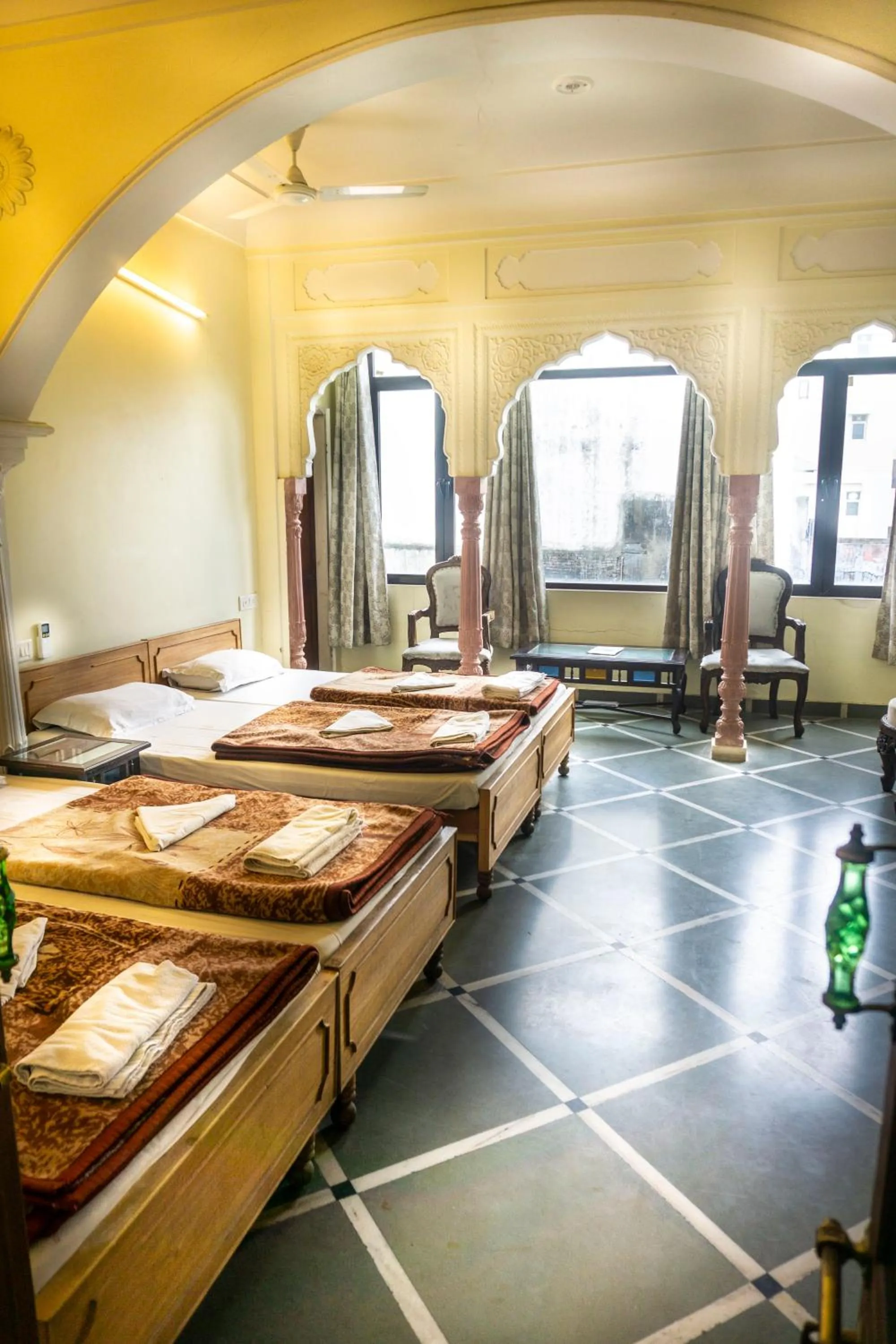 Bed in Krishna Palace - A Heritage Boutique Hotel