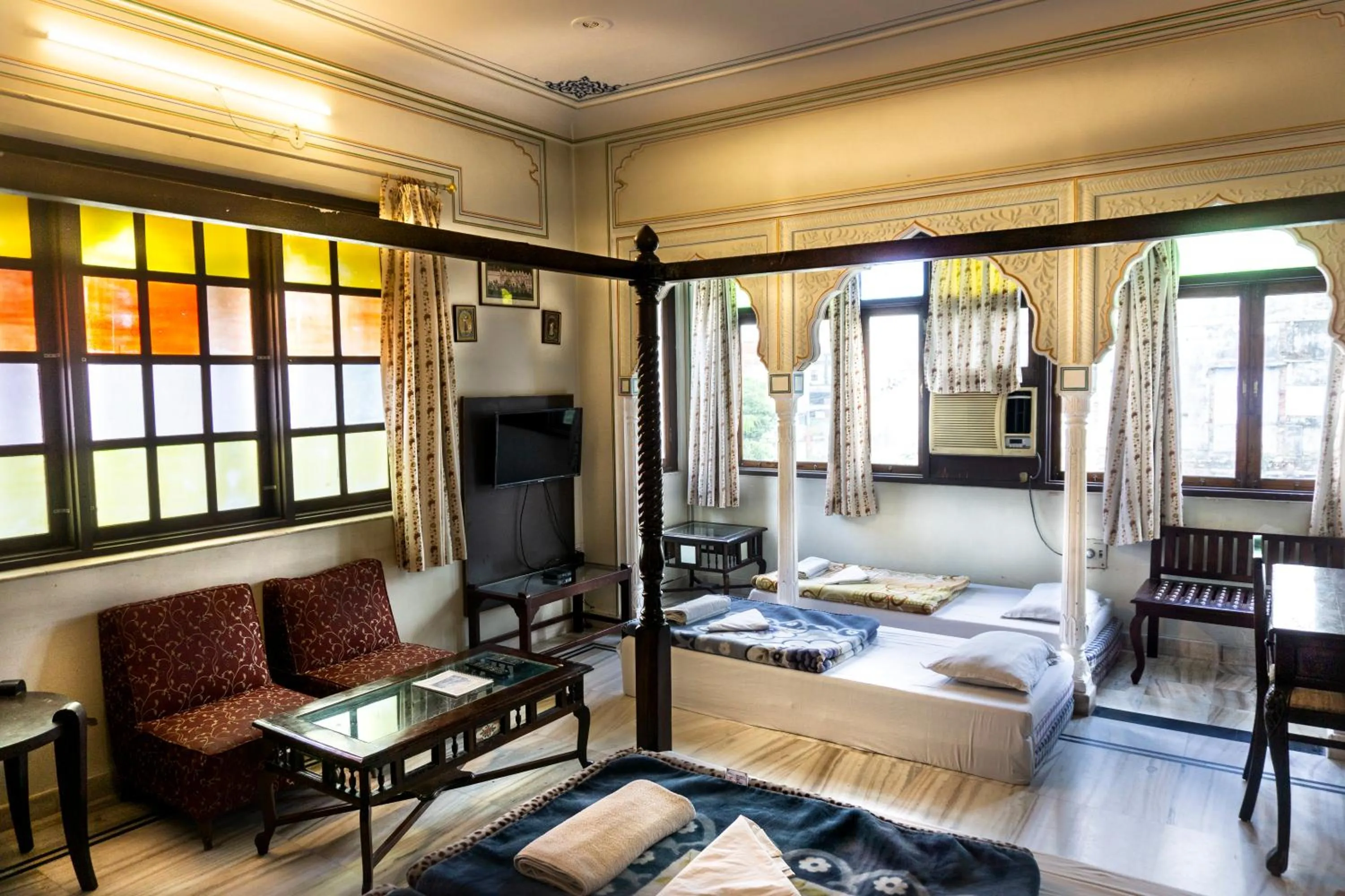 Bed in Krishna Palace - A Heritage Boutique Hotel