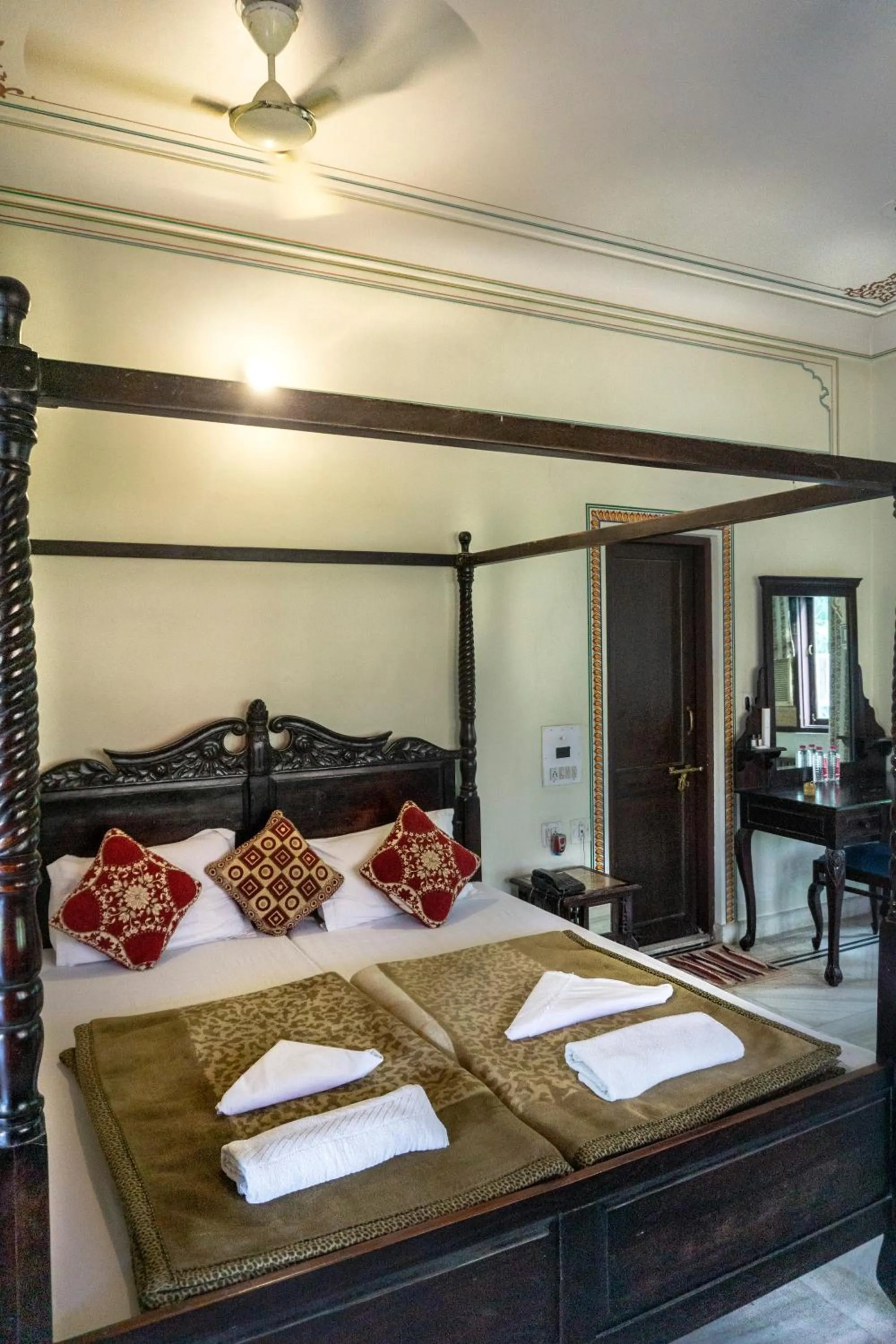 Bed in Krishna Palace - A Heritage Boutique Hotel