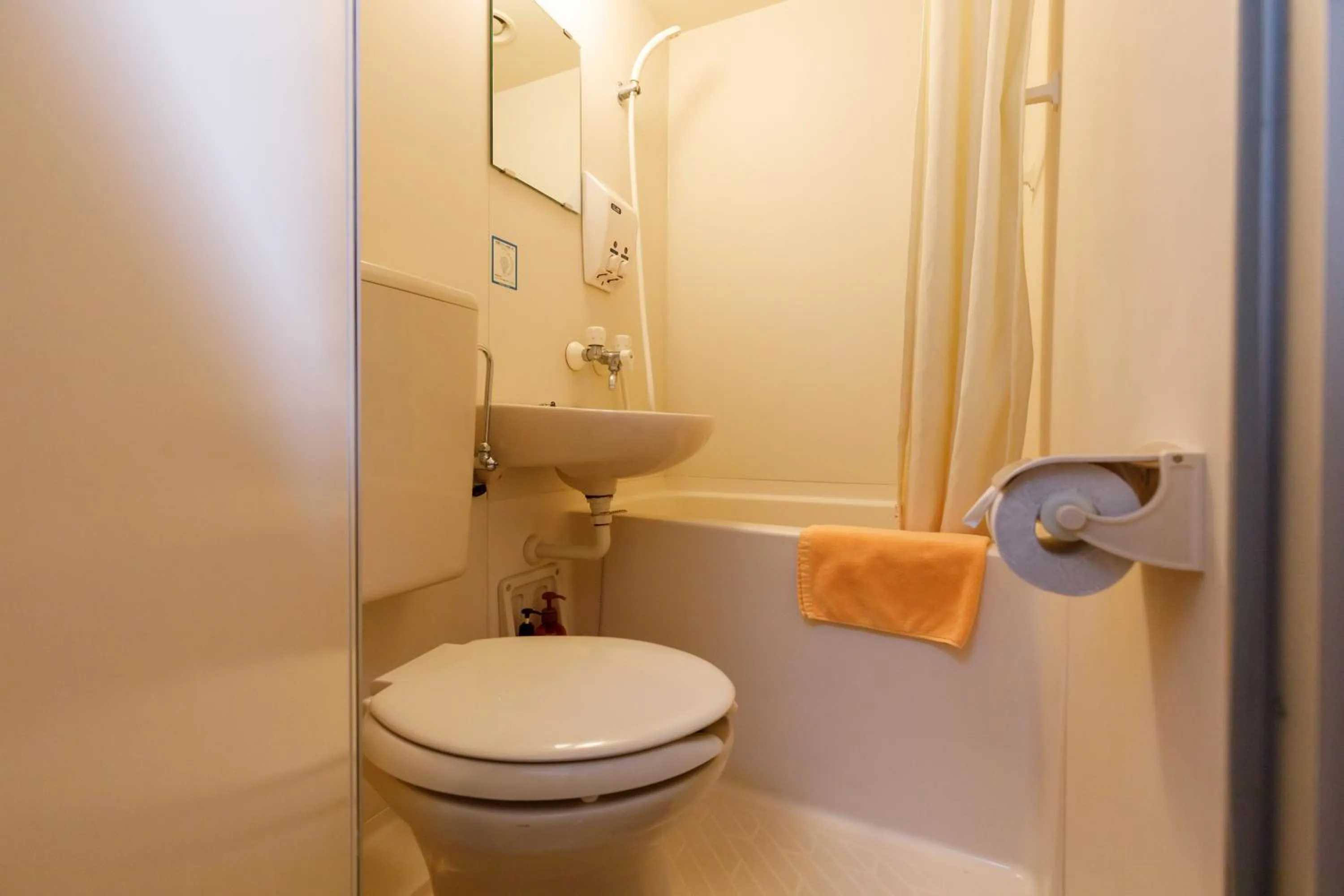 Toilet in ホテルにれの樹