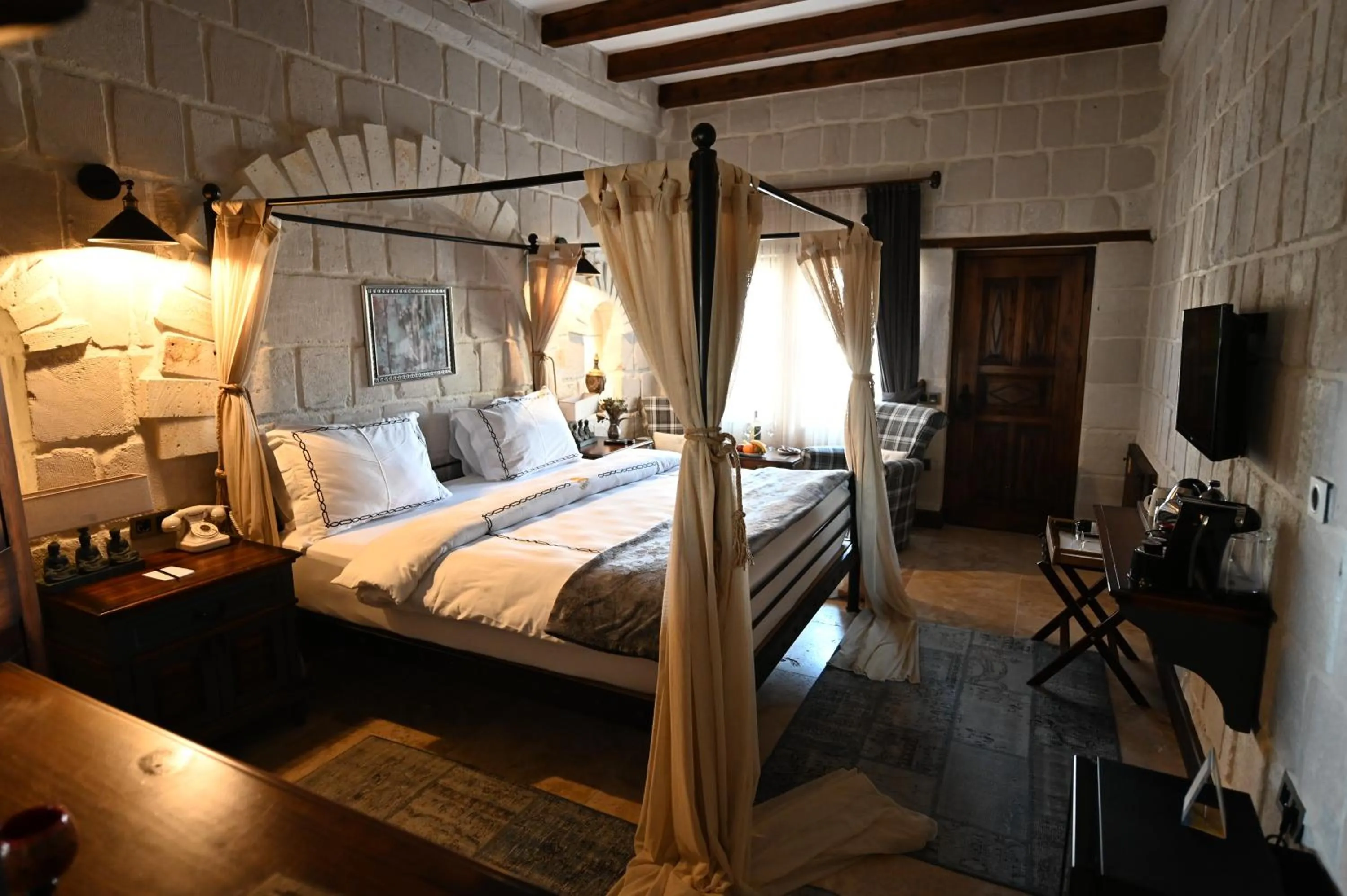 Photo of the whole room, Bed in Seraphim Cave Suites & SPA