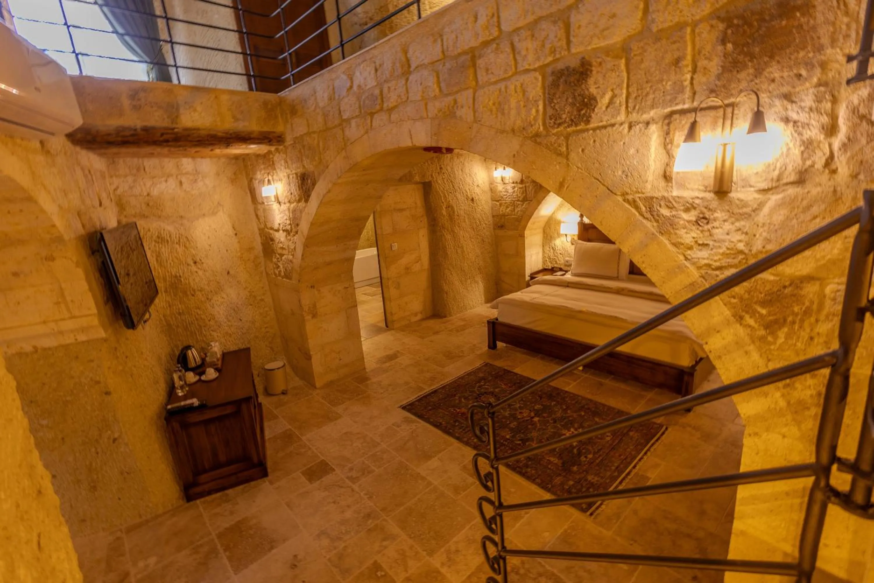 Photo of the whole room, Bed in Seraphim Cave Suites & SPA