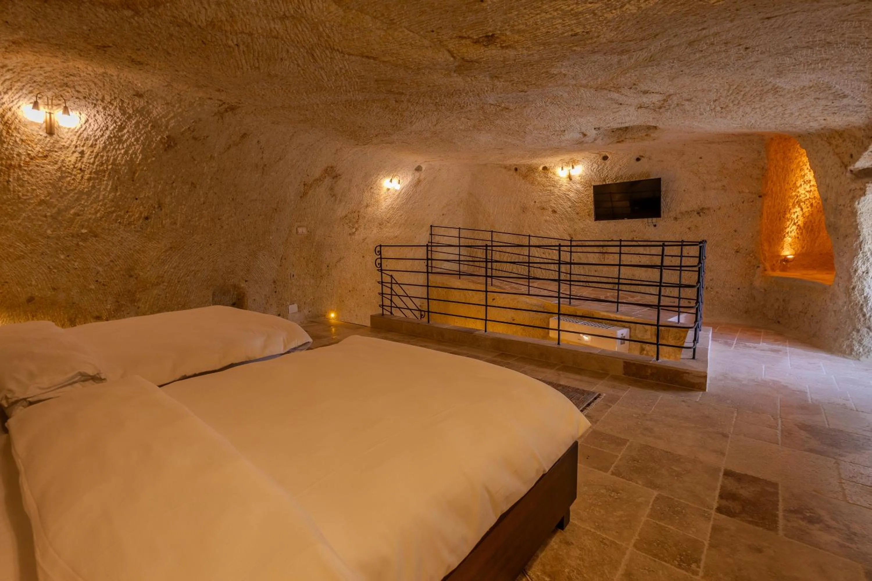 Photo of the whole room, Bed in Seraphim Cave Suites & SPA