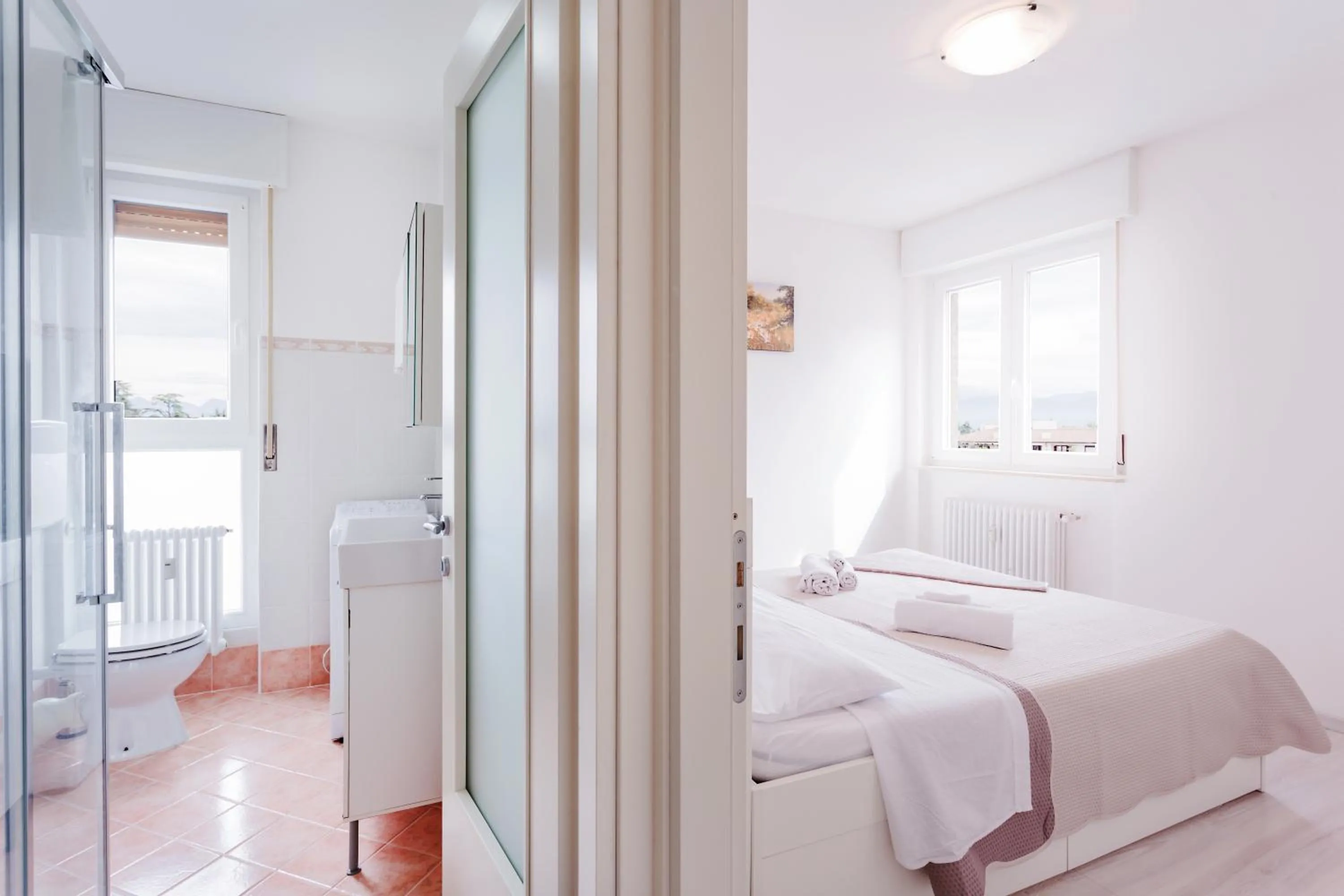 Bathroom, Bed in GuestHost - Bilocale Via Forni