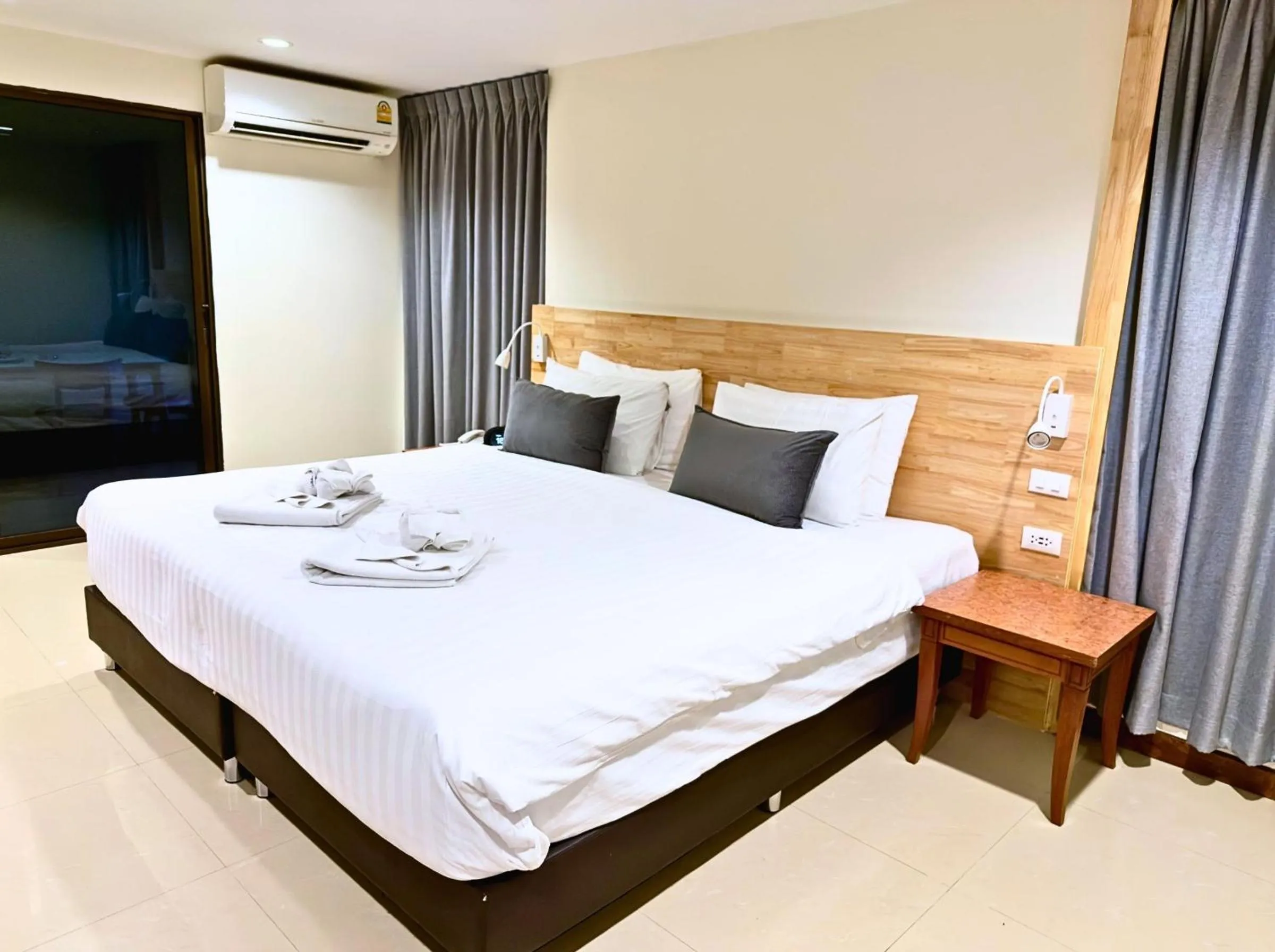 Bed in Orchid Garden Hotel Patong