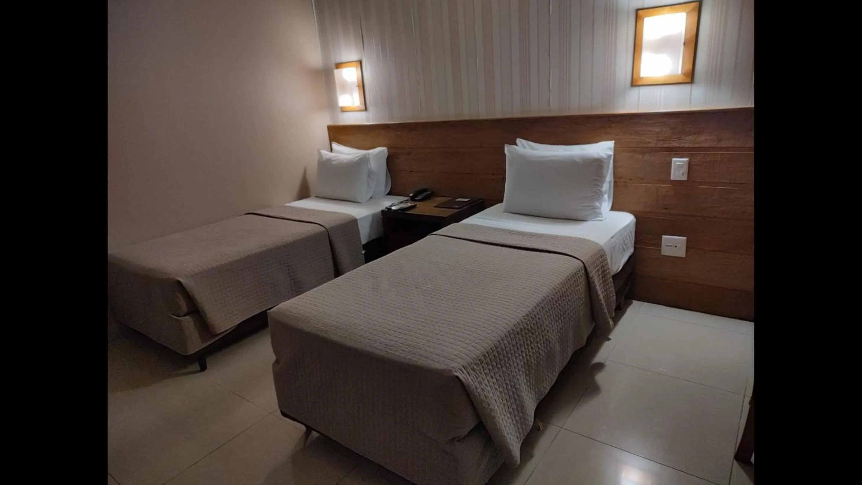 Bed in Hotel Pousada Santa Rita