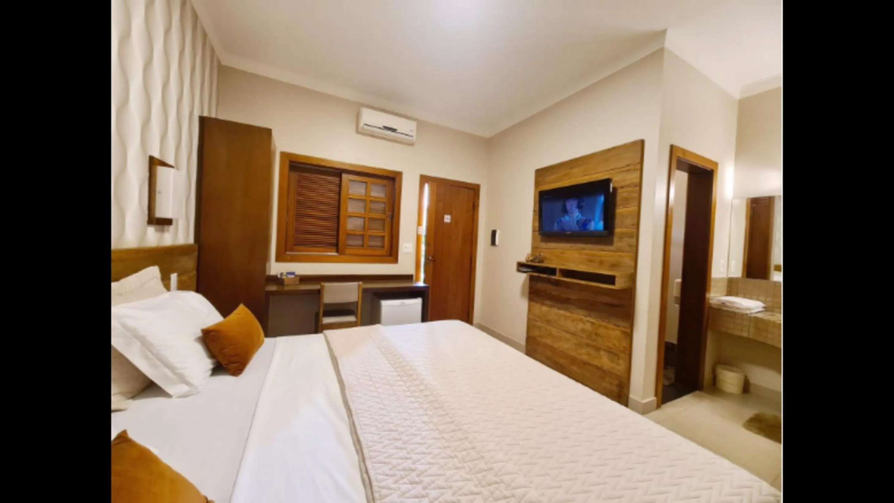 Bed in Hotel Pousada Santa Rita