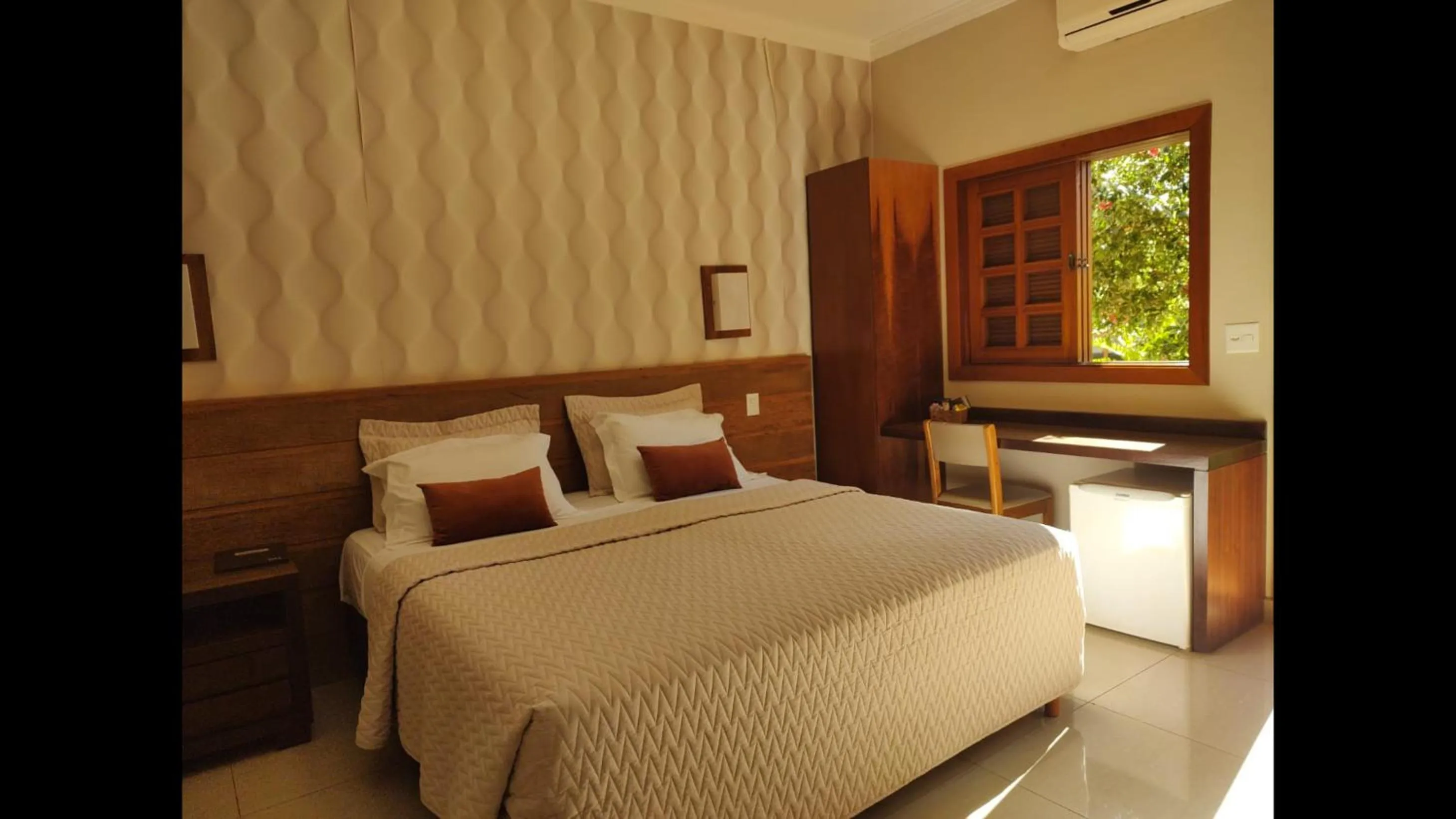 Bed in Hotel Pousada Santa Rita