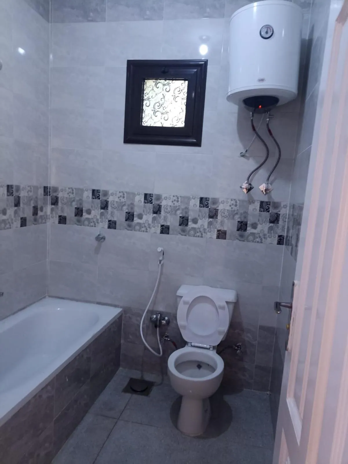 Toilet in Awi Guest House