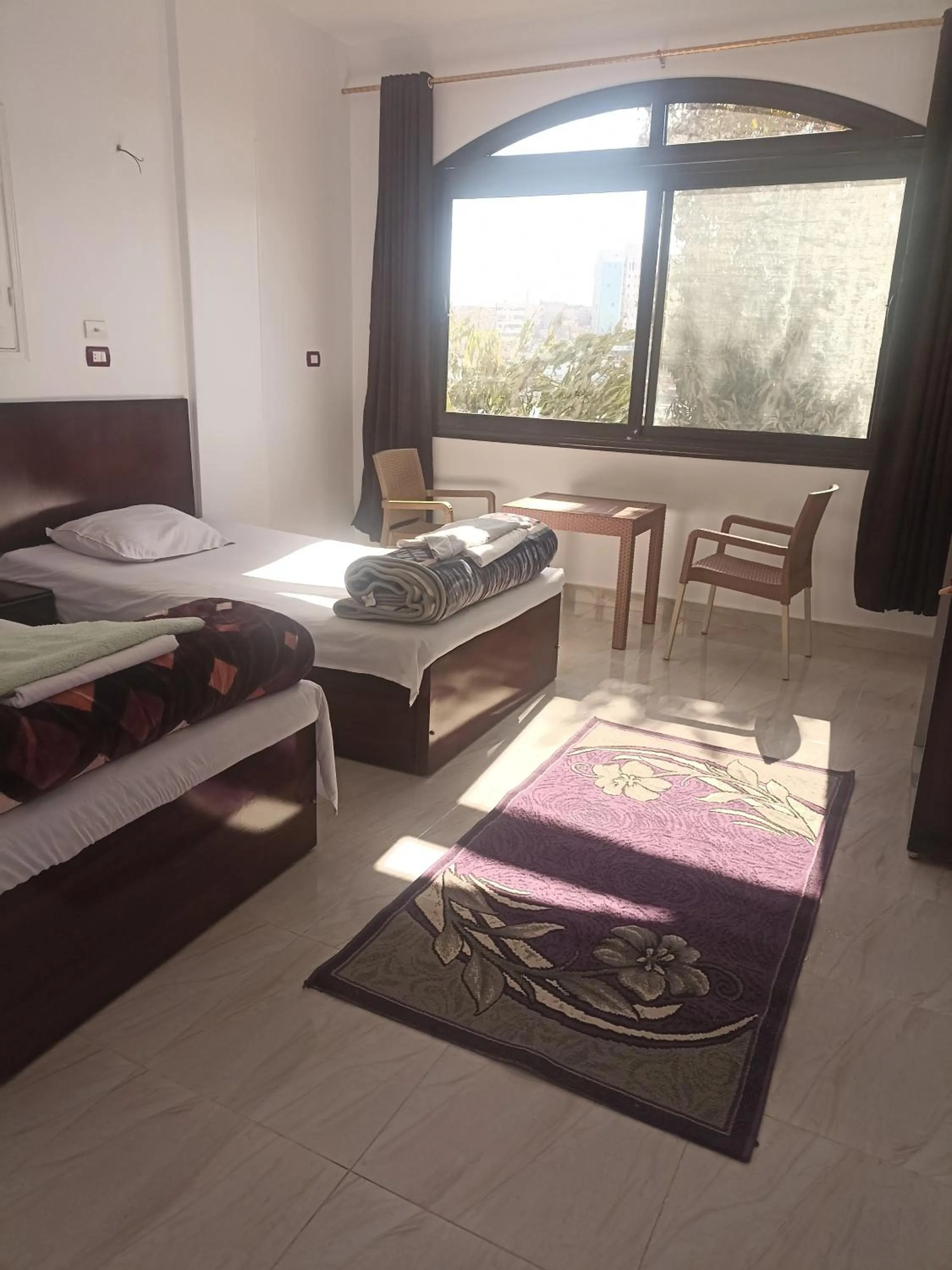 Bed in Awi Guest House