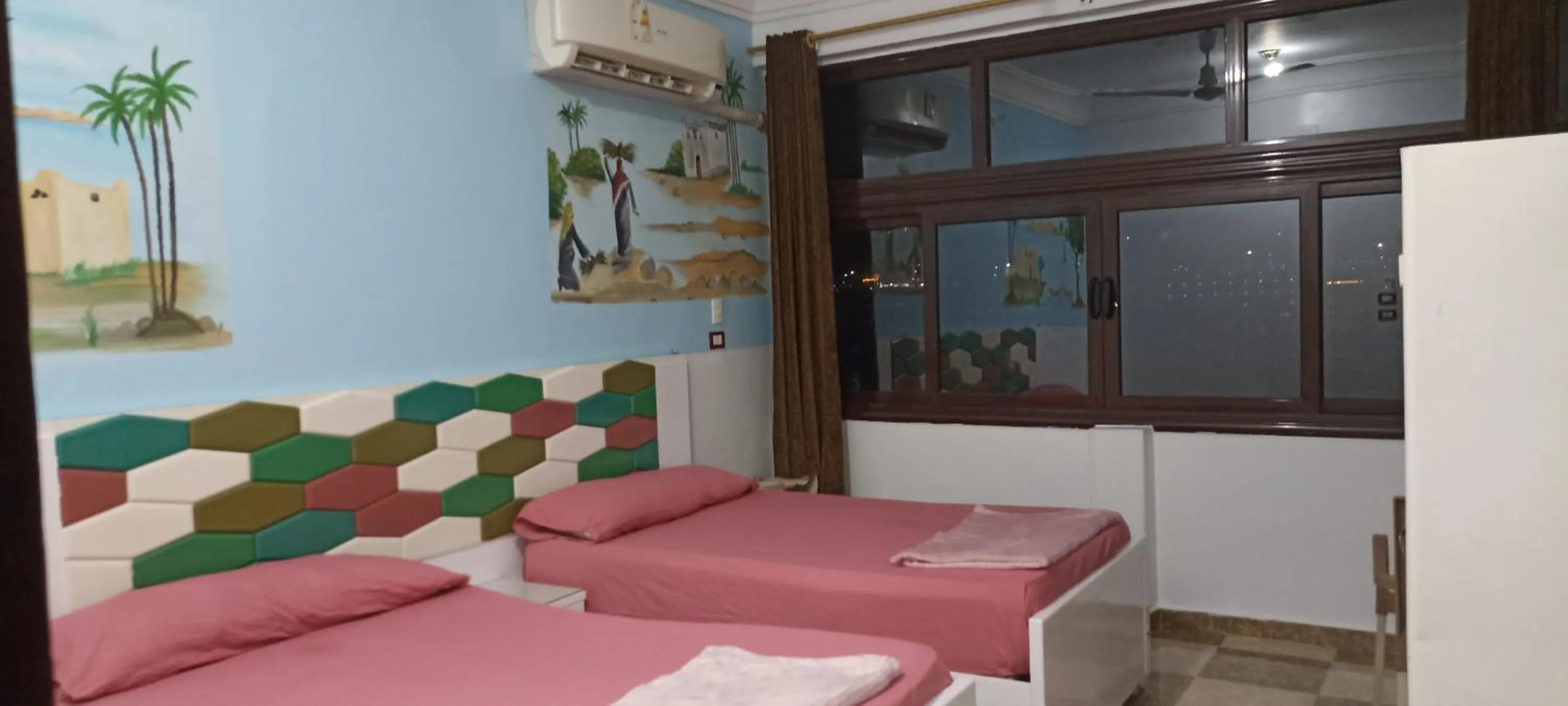 Bed in Awi Guest House