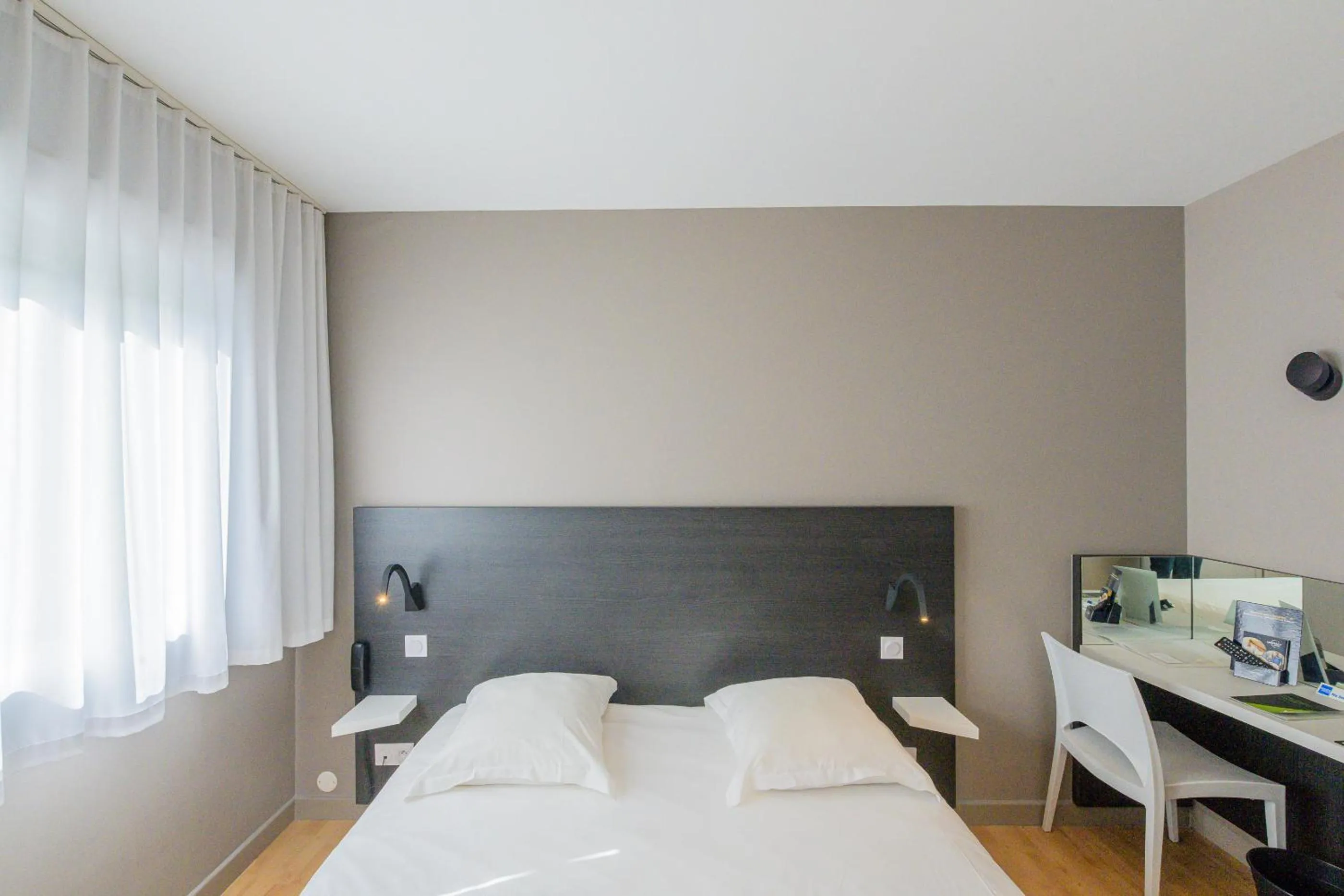 Bed in Hôtel Vulcain