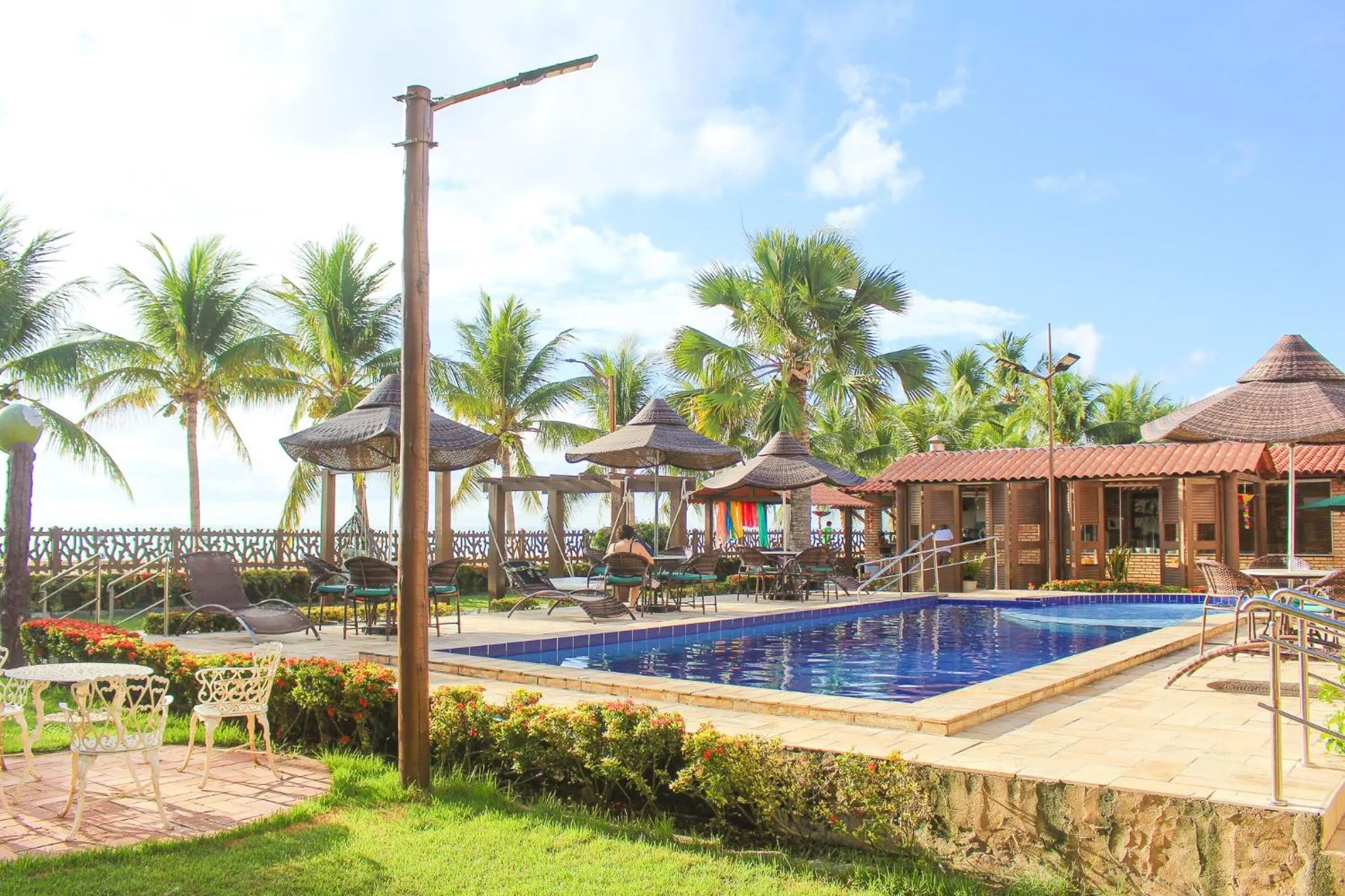 Swimming pool in Pousada Coqueiro Verde
