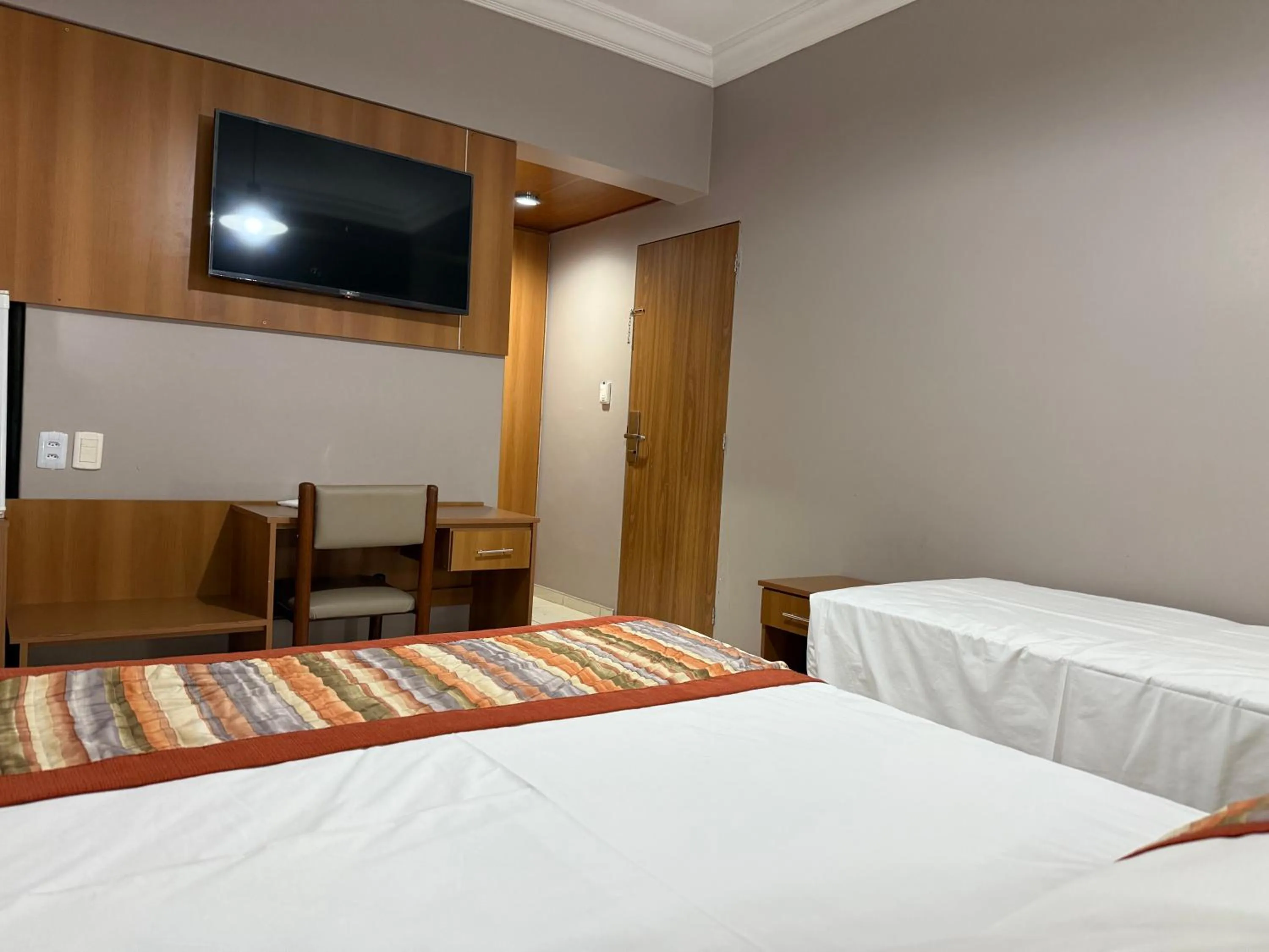 Bed in Mato Grosso Palace Hotel