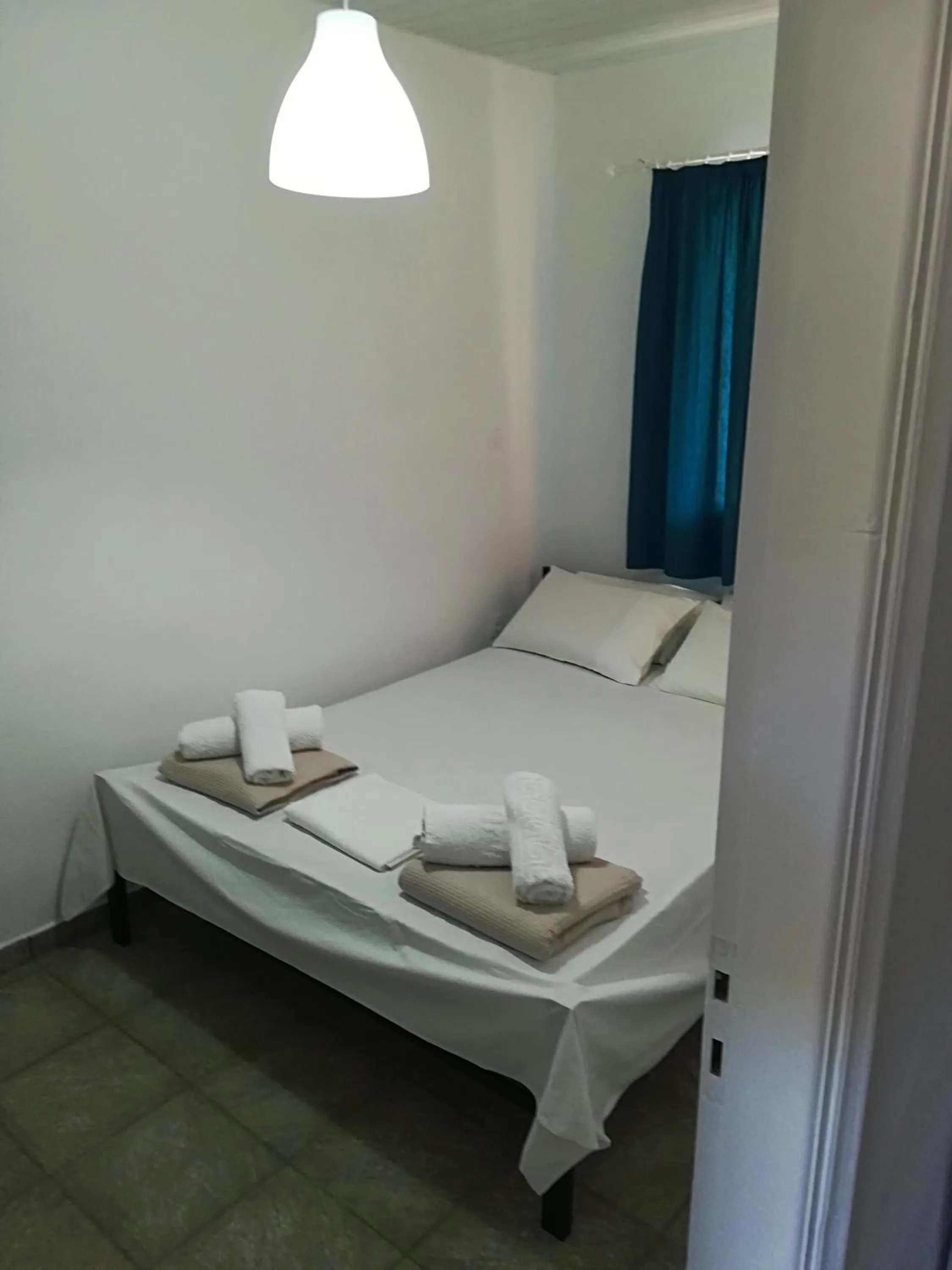 Bed in KOUVERTA APARTMENTS