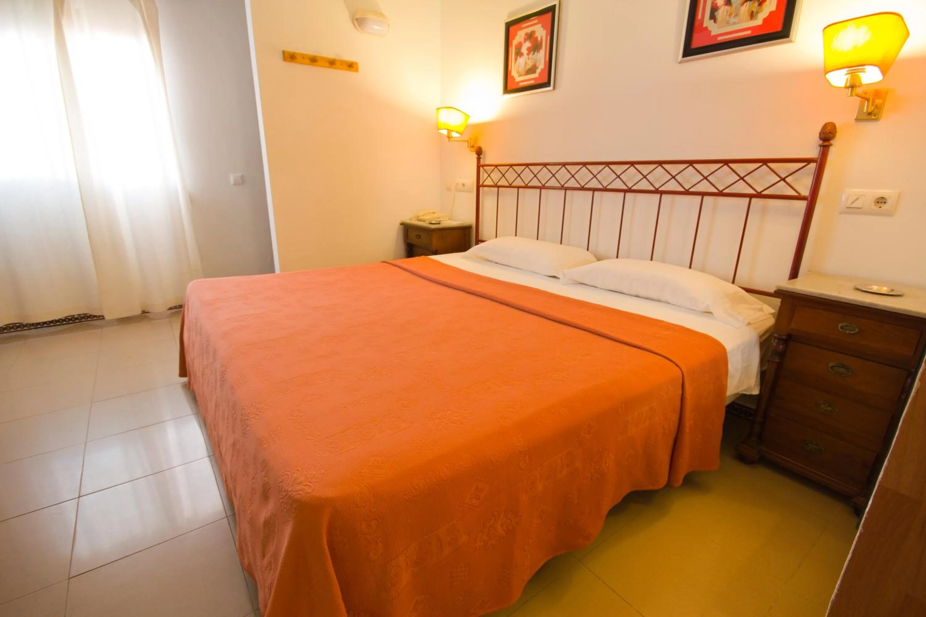 Bed in Hostal Nueva Andalucia