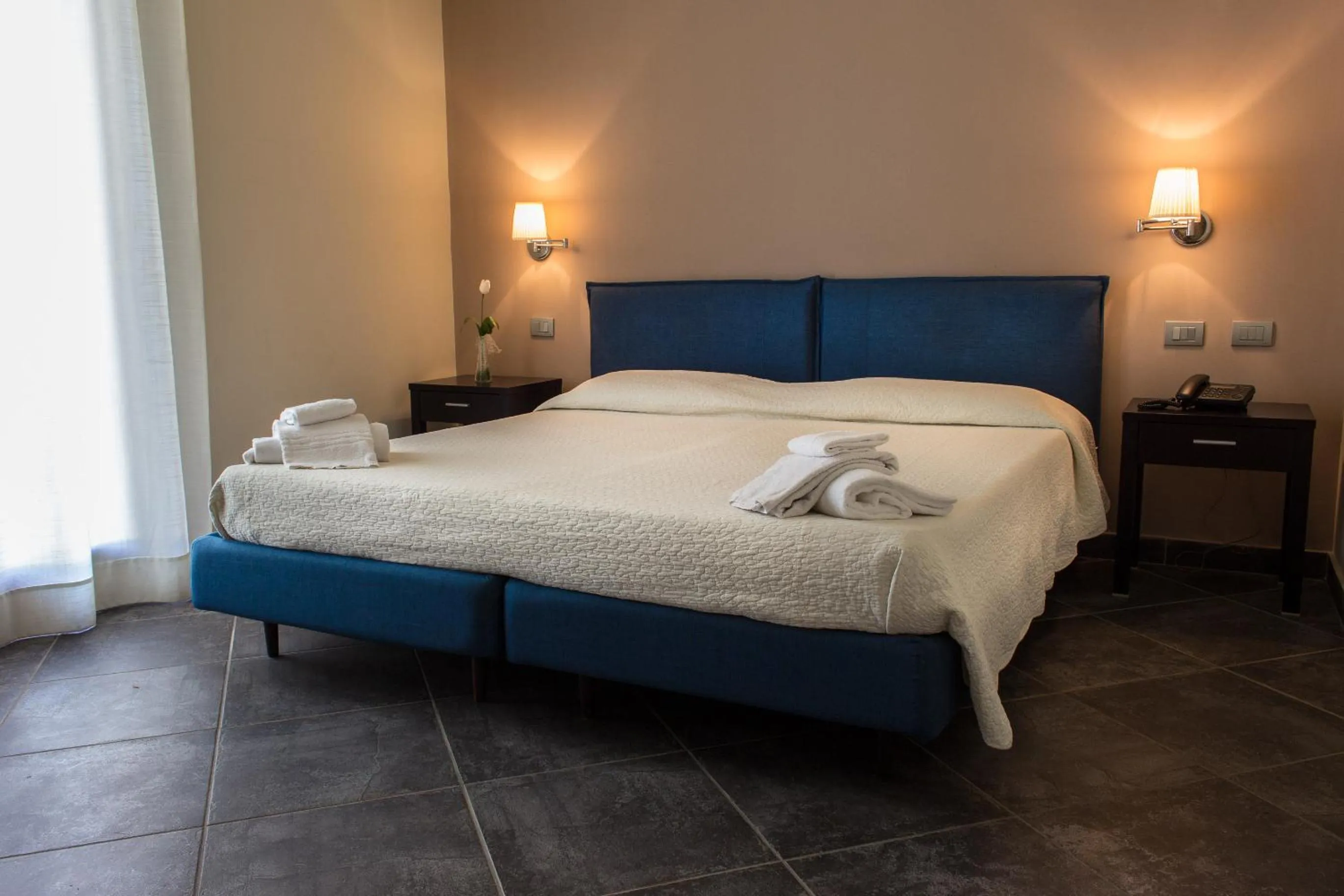 Bed in Hotel La Cavalera