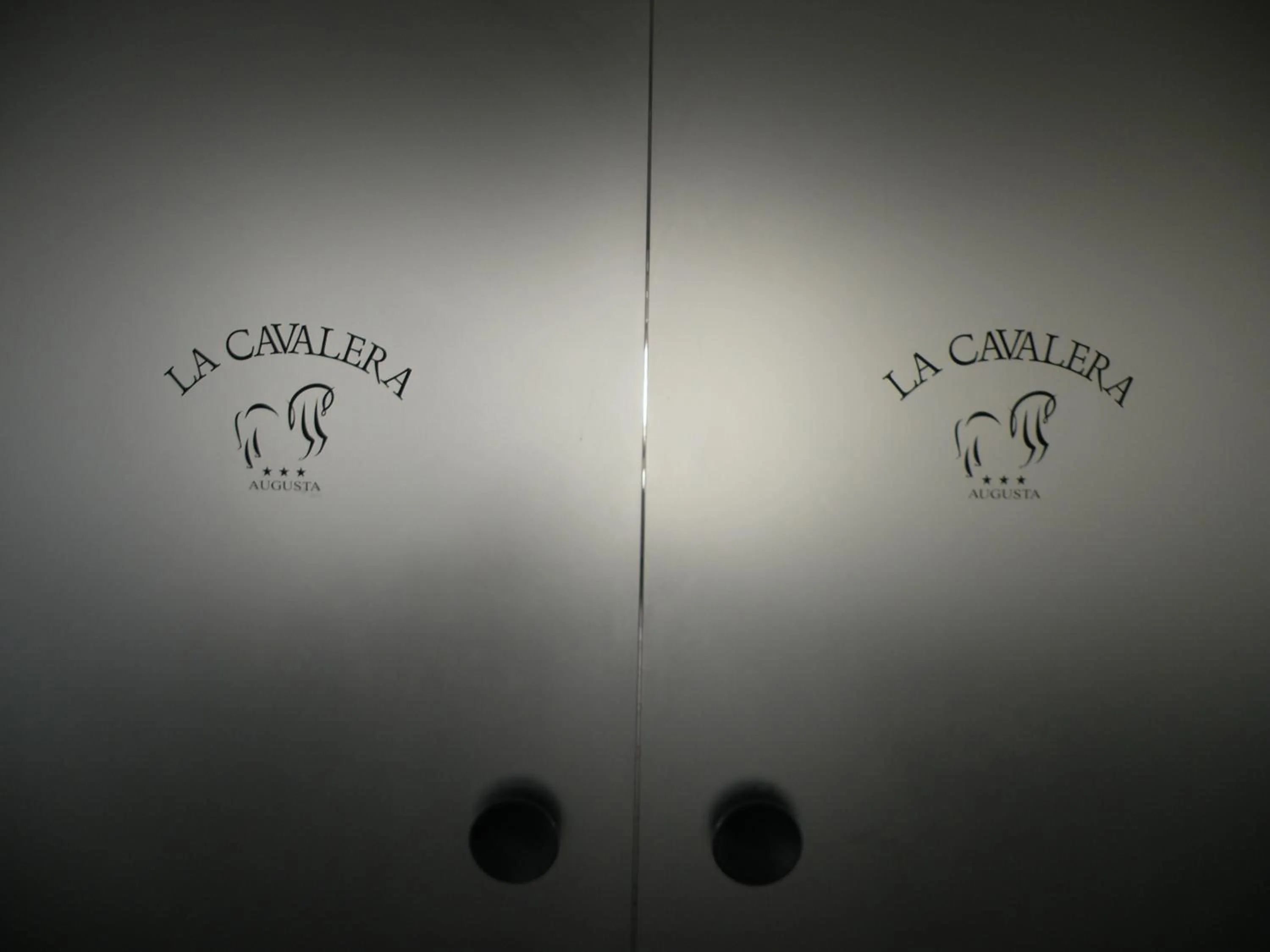 Property logo or sign in Hotel La Cavalera