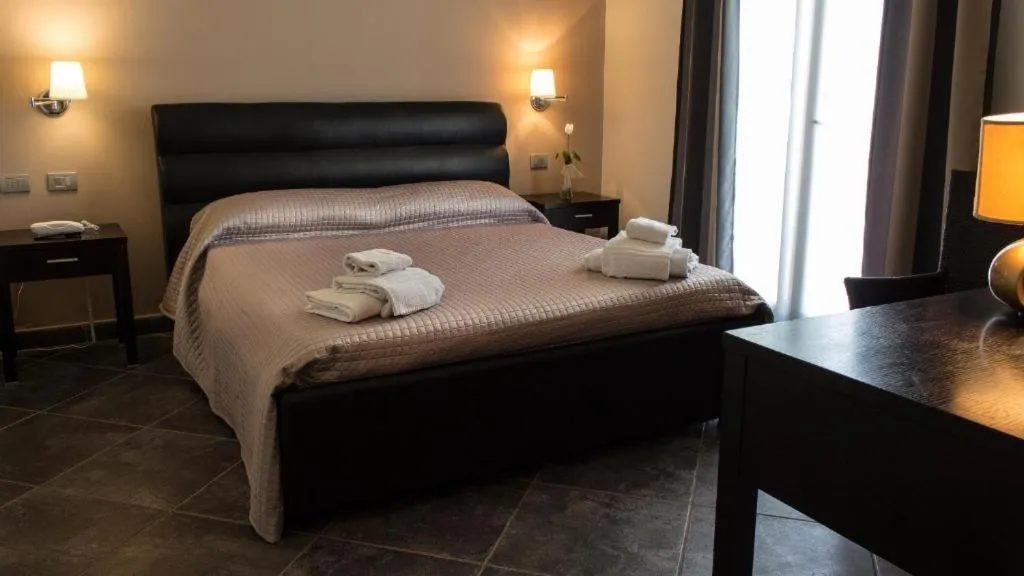 Bed in Hotel La Cavalera