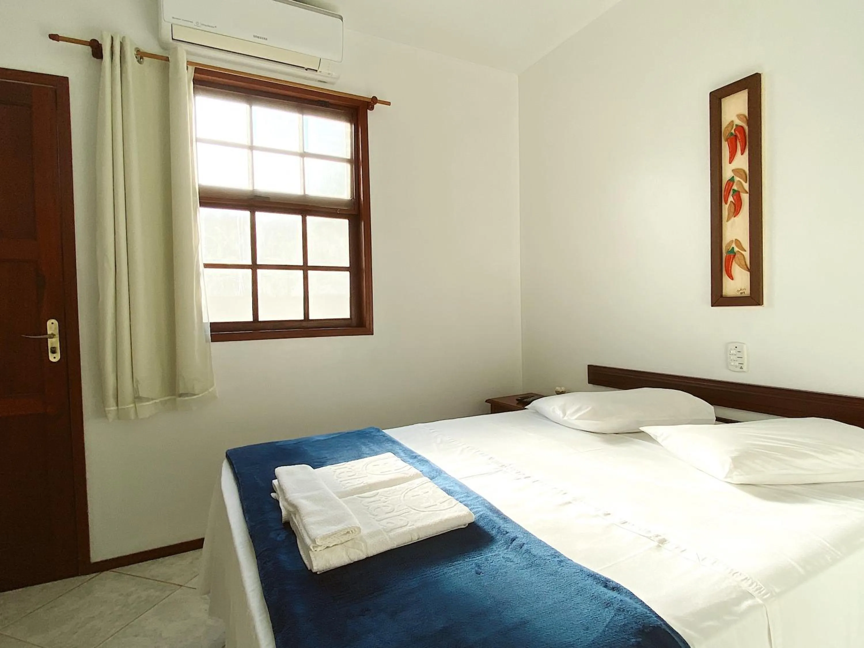 Bed in HOTELARE Hotel Brunello