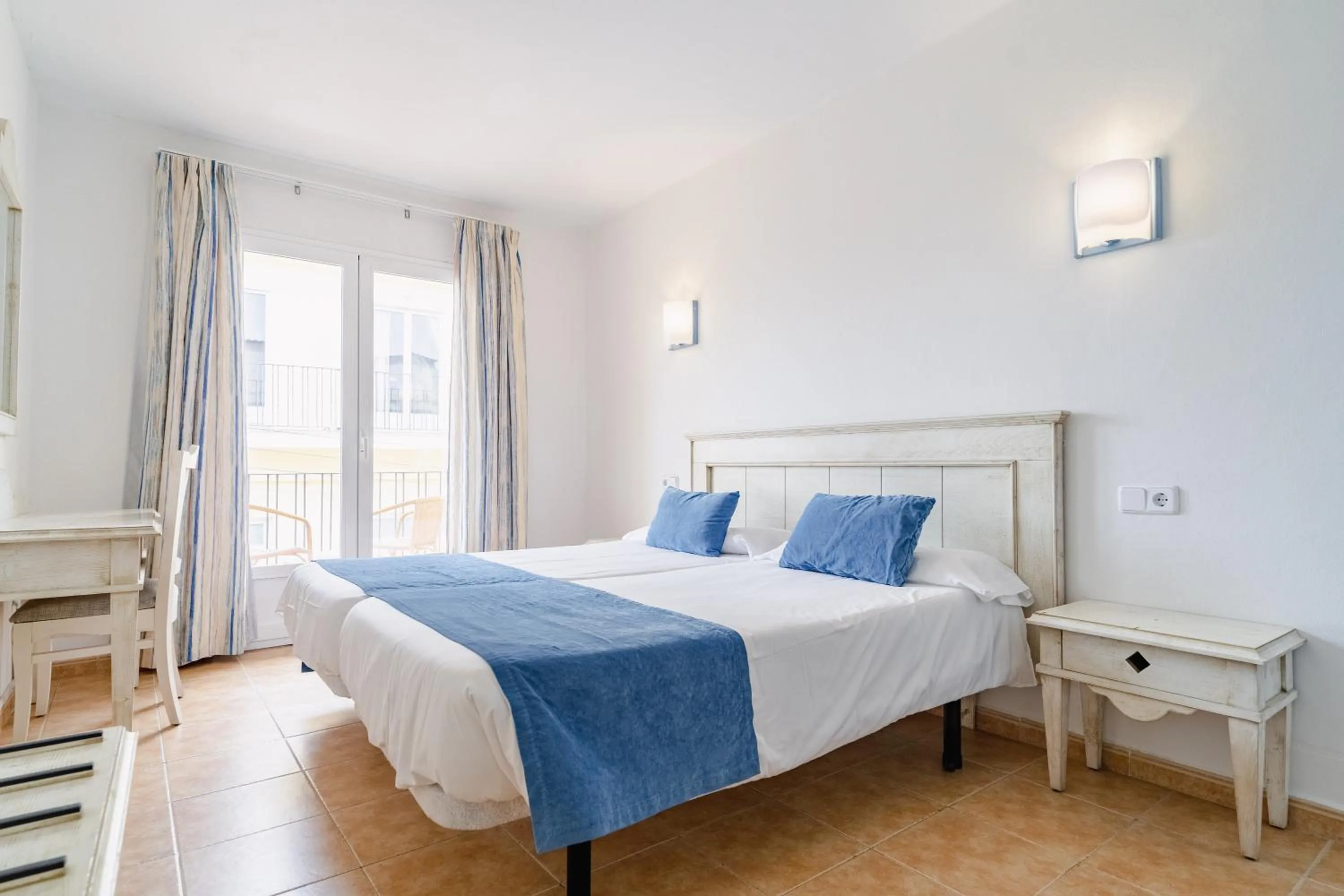 Bed in Hostal HPC Porto Colom