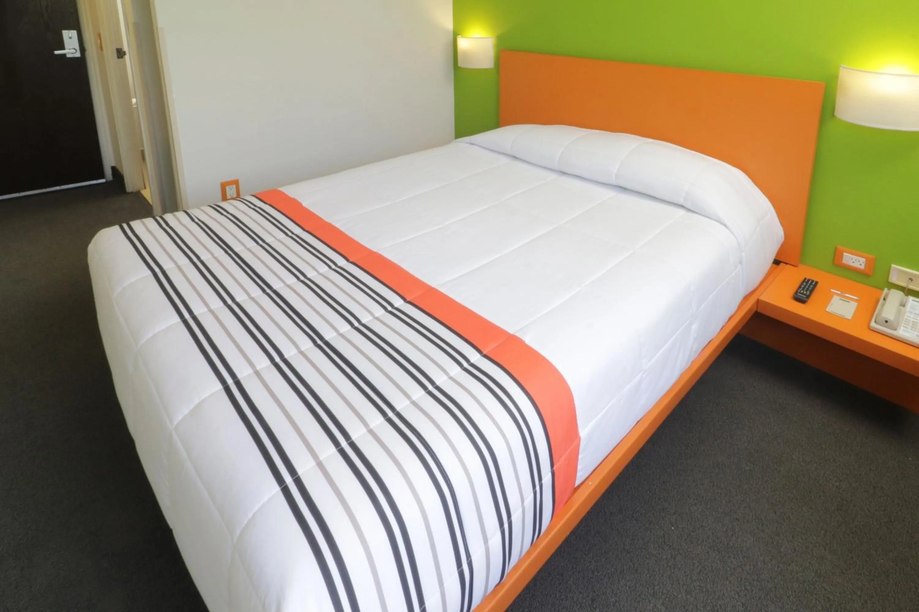 Photo of the whole room, Bed in City Express Junior by Marriott Guadalajara Periferico Sur