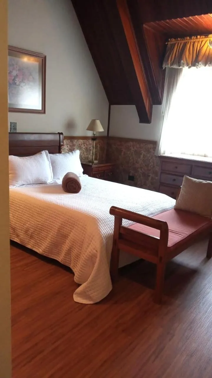 Bed in Center Suiço Flats