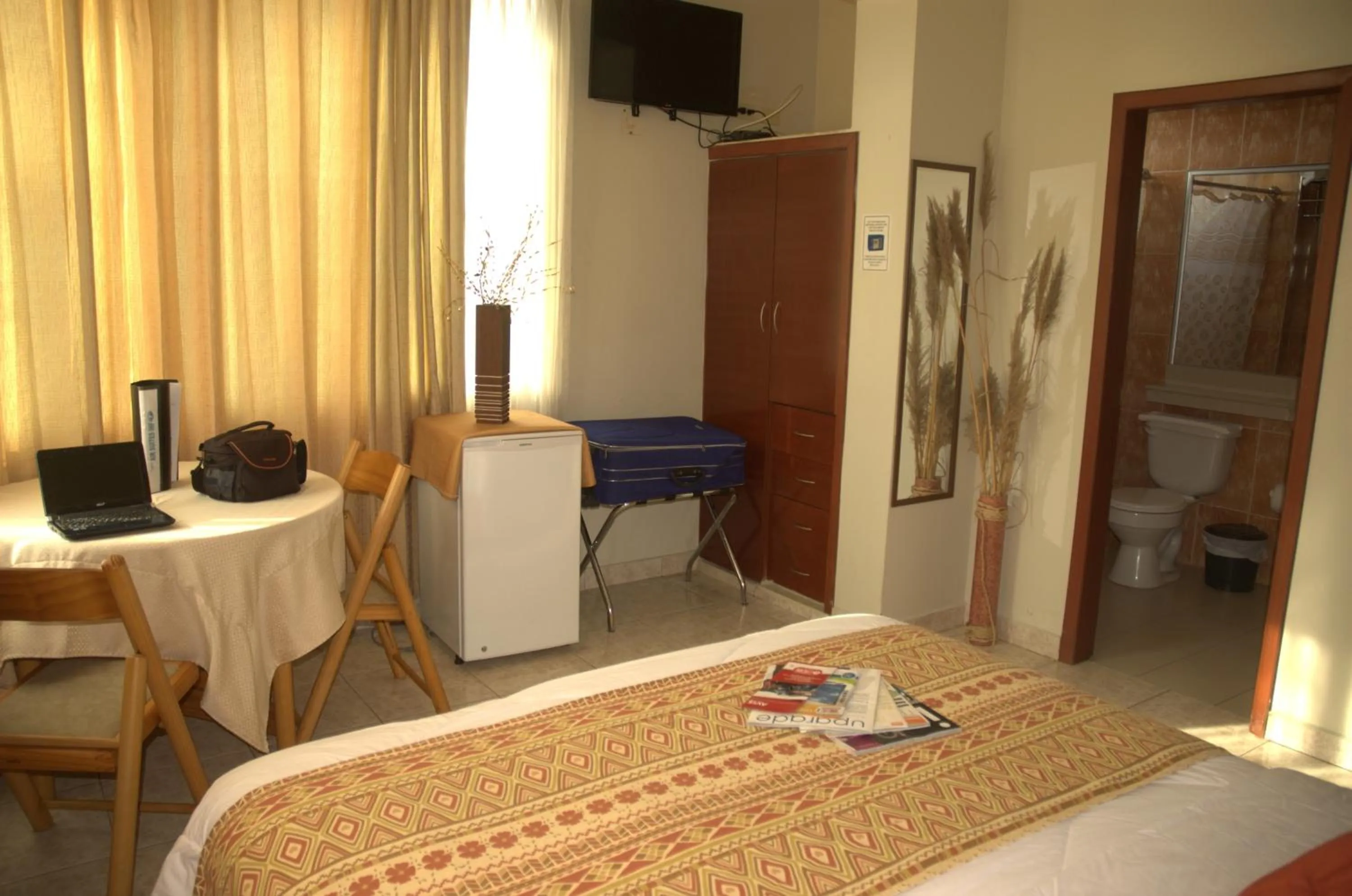 Bed in Hotel Air Suites