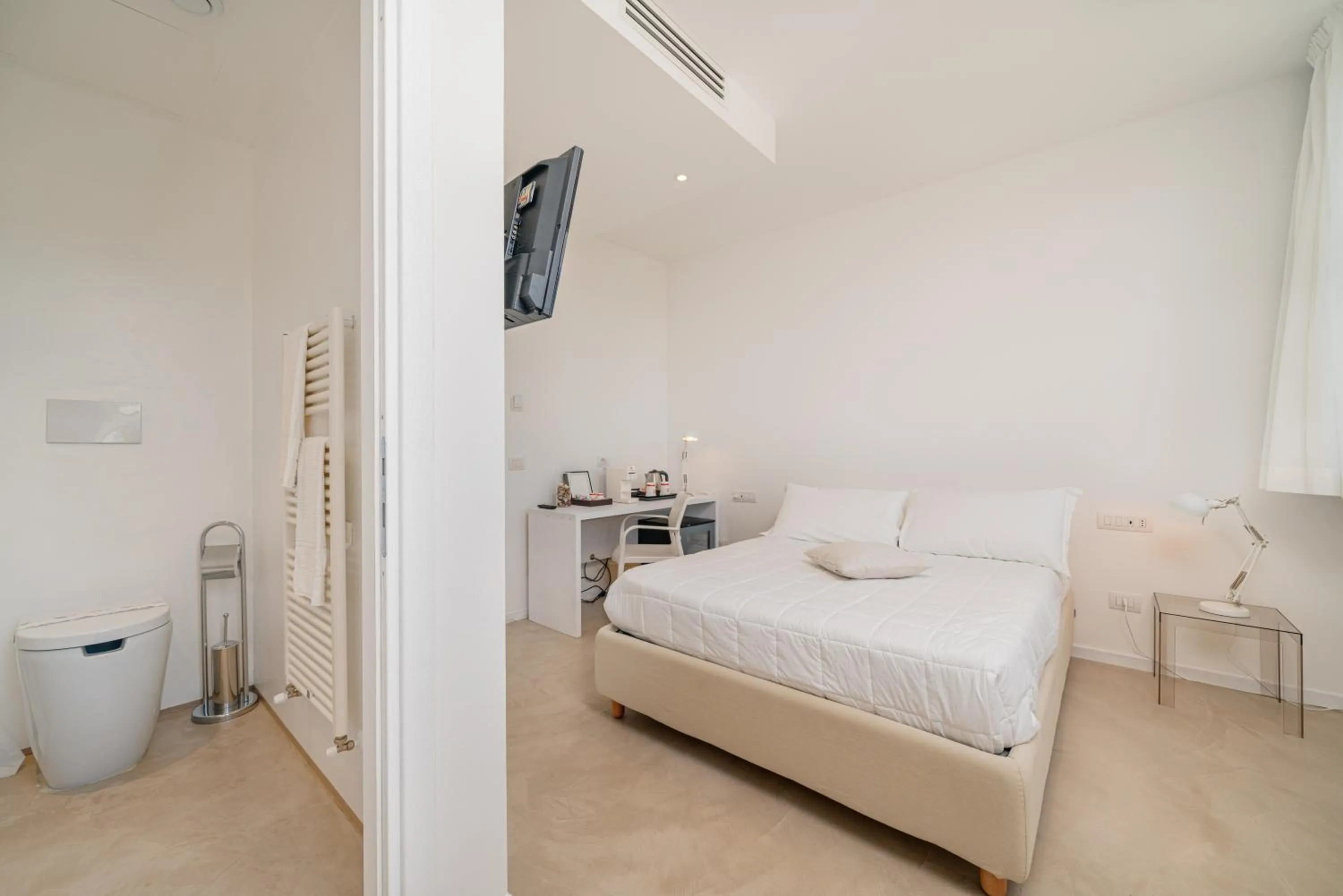 Bed in Jatika Boutique Hotel