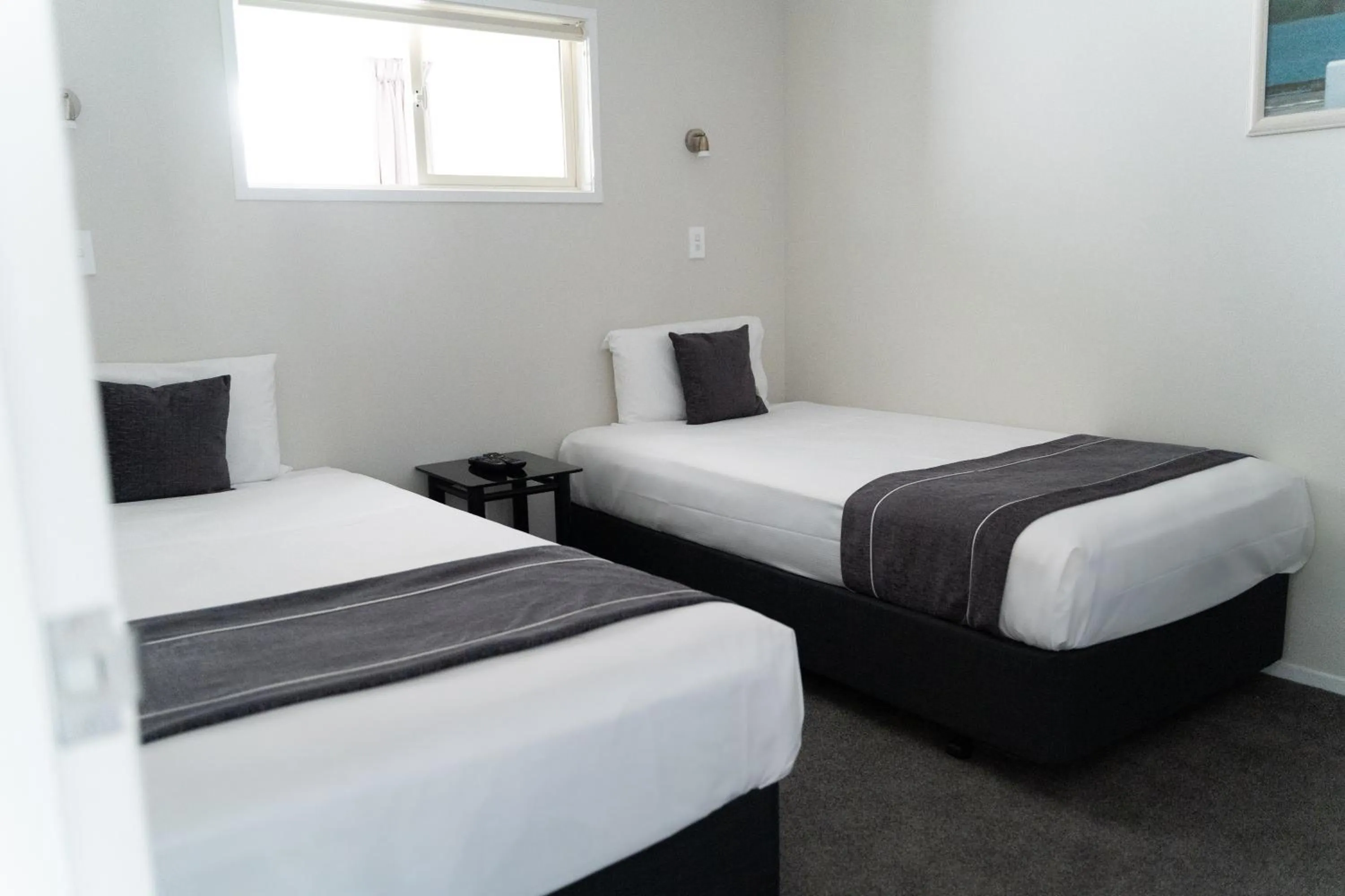 Bed in Pacific Coast Motor Lodge