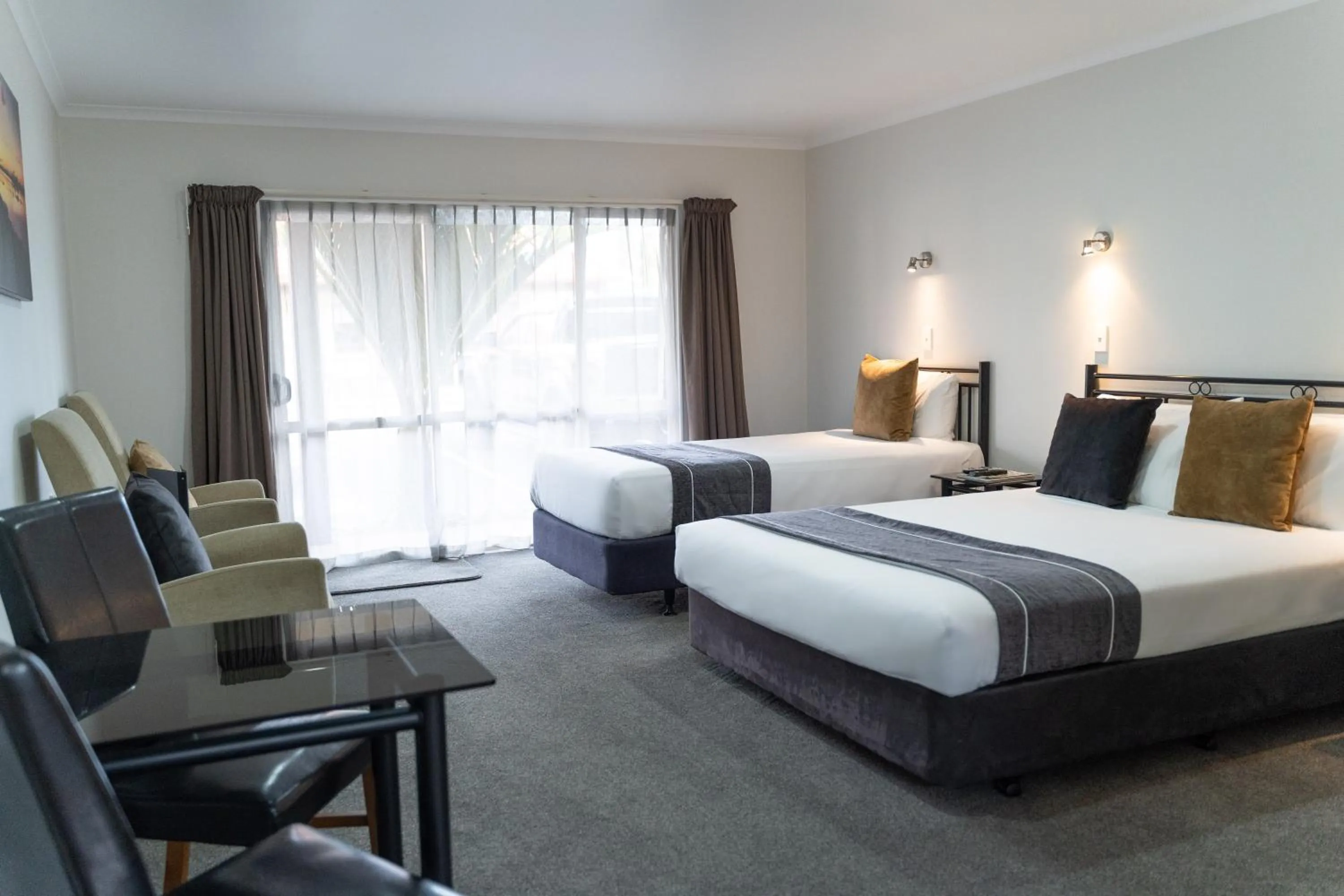 Bed in Pacific Coast Motor Lodge