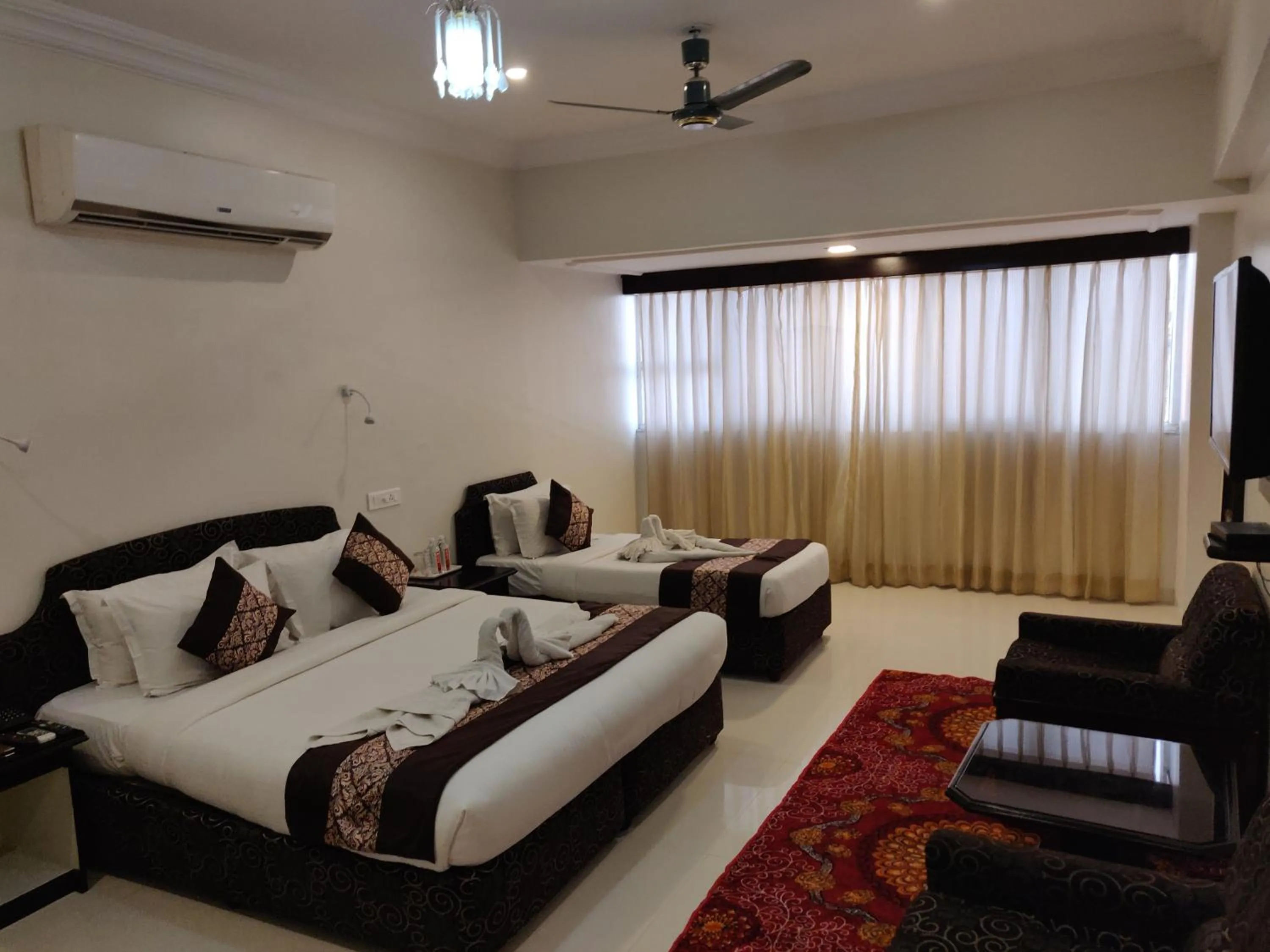 Photo of the whole room, Bed in Chandra Inn