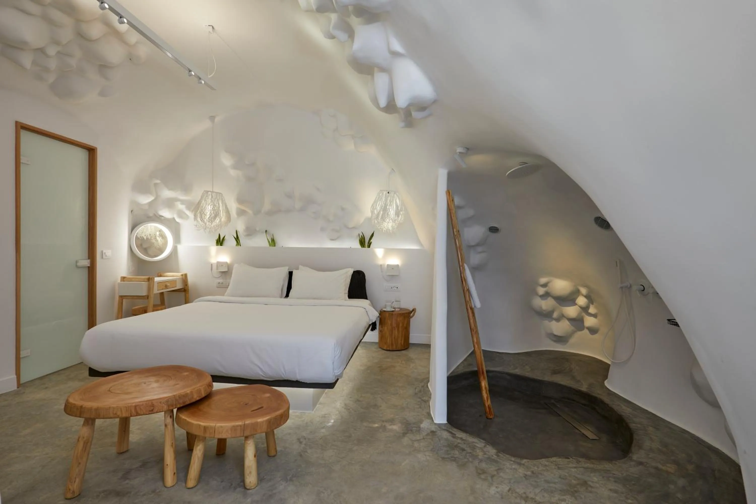 Bed in Theano Cave Suites & Villas
