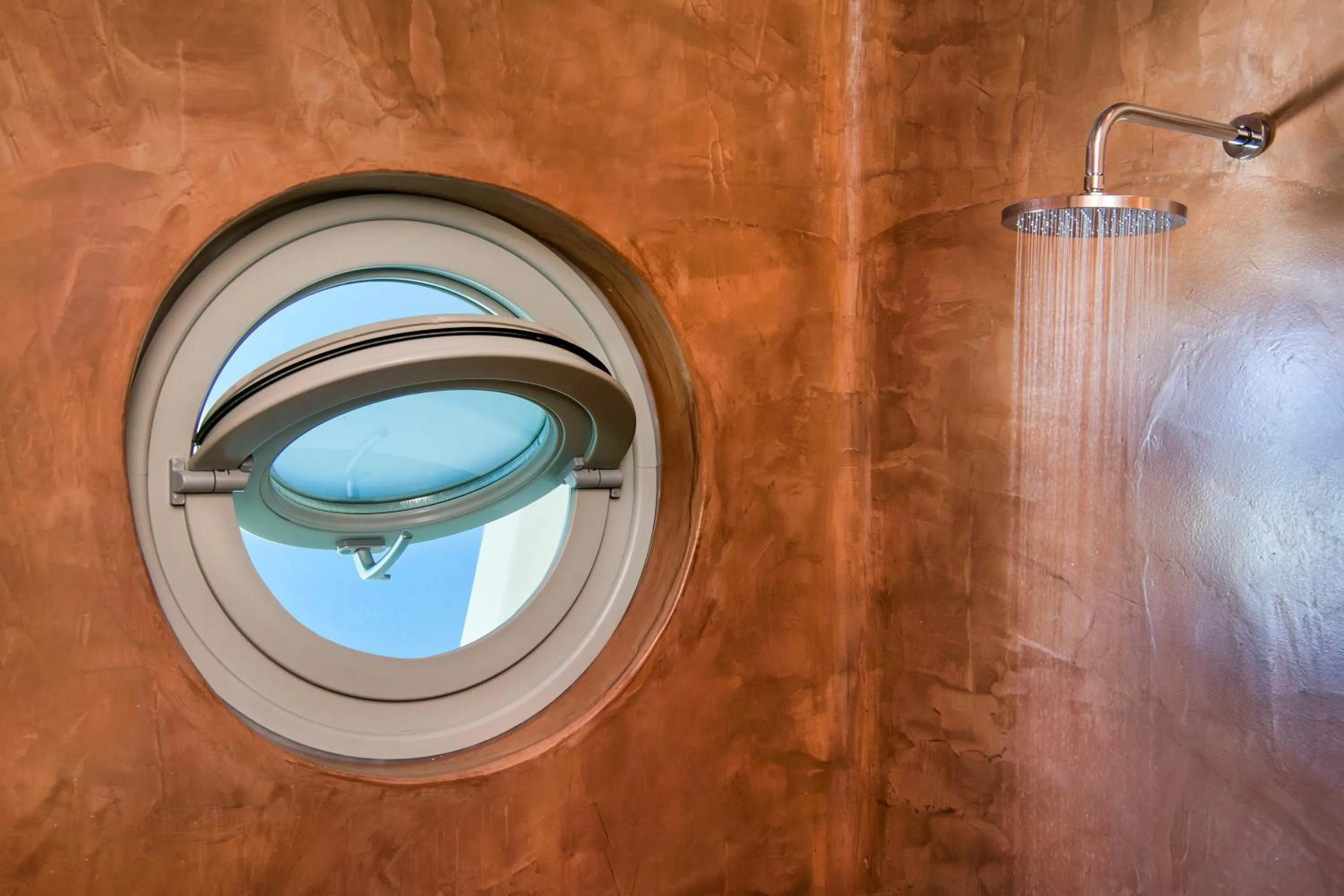 Bathroom in Theano Cave Suites & Villas