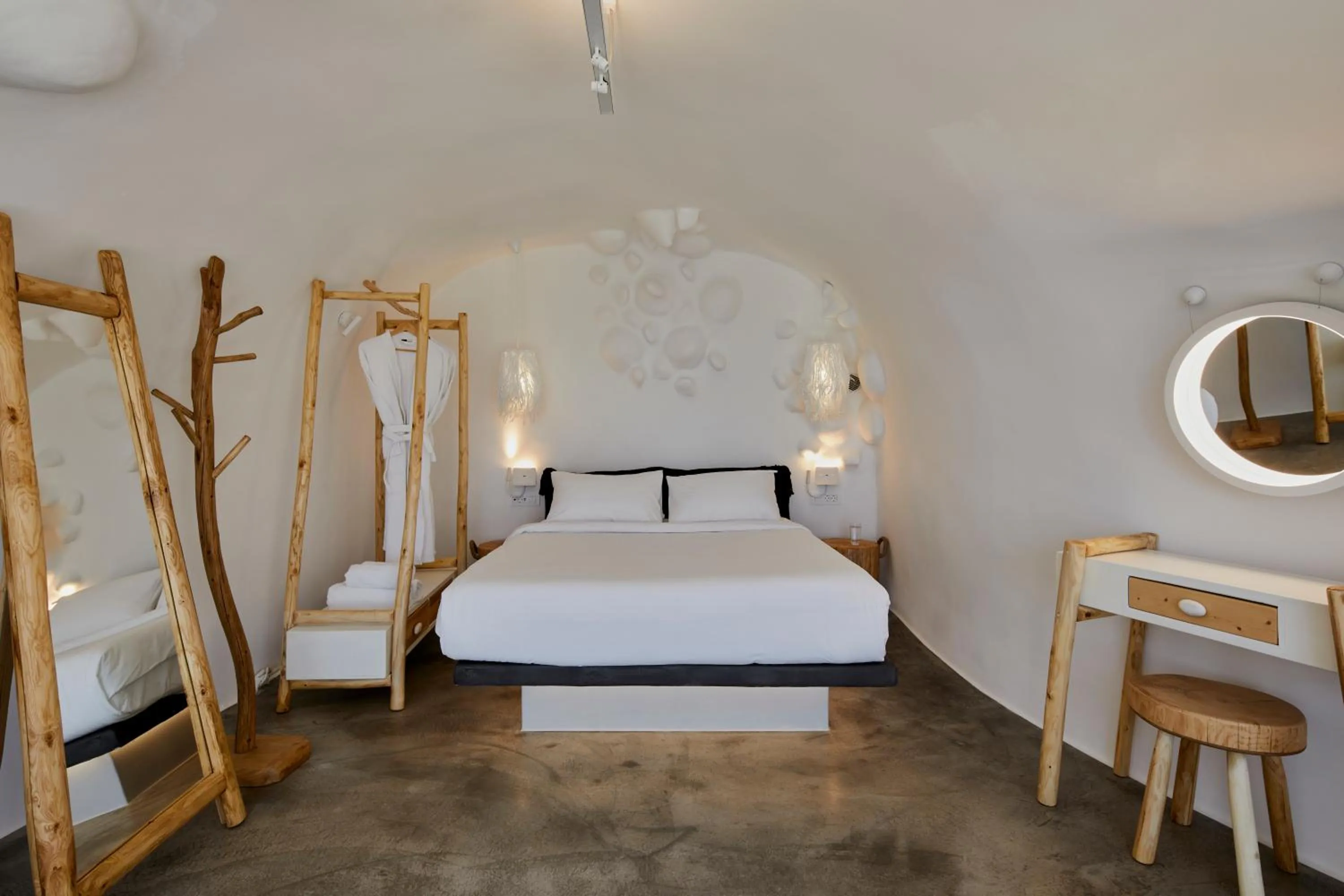 Bed in Theano Cave Suites & Villas