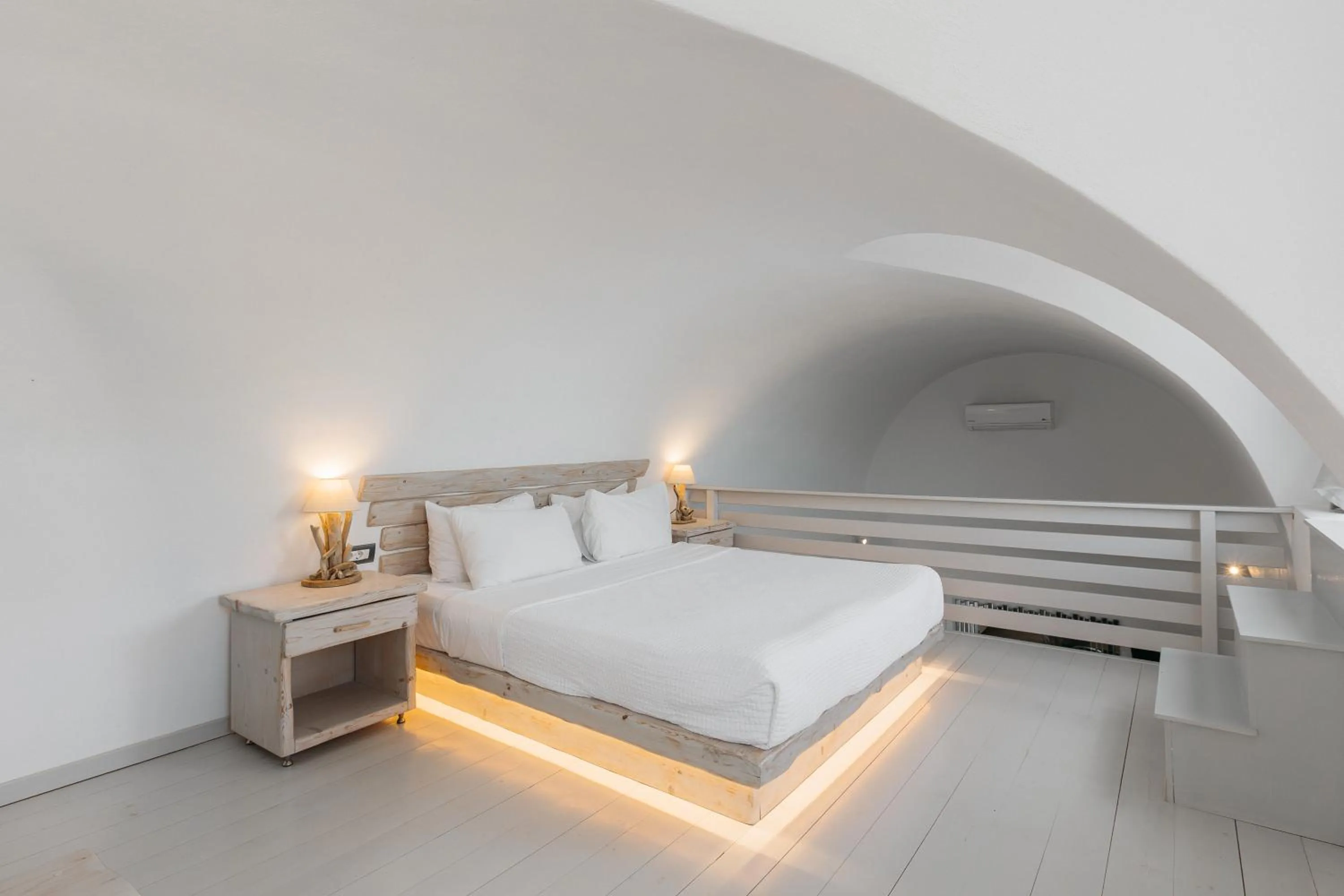 Bed in Theano Cave Suites & Villas