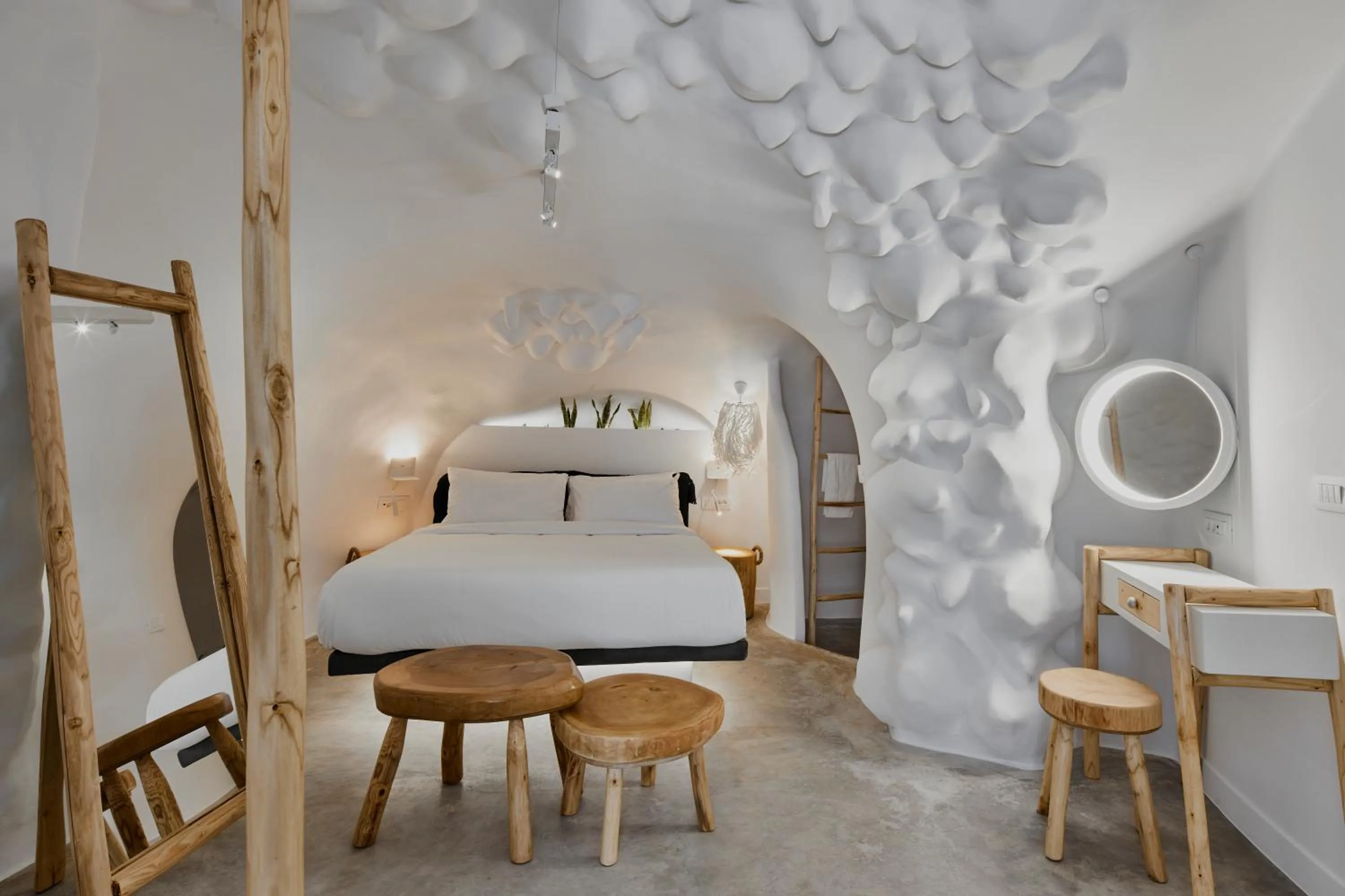 Bed in Theano Cave Suites & Villas