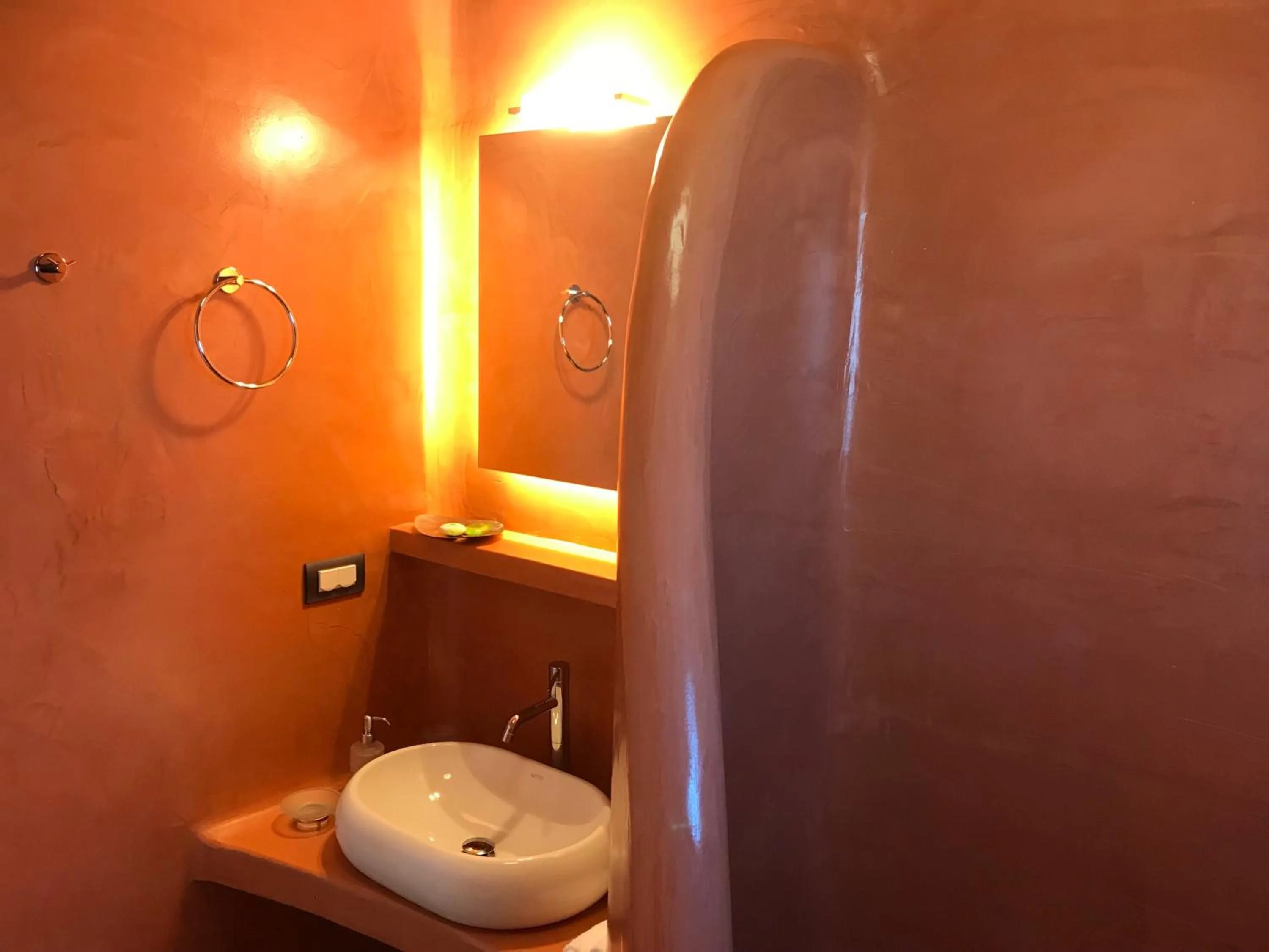 Bathroom in Theano Cave Suites & Villas