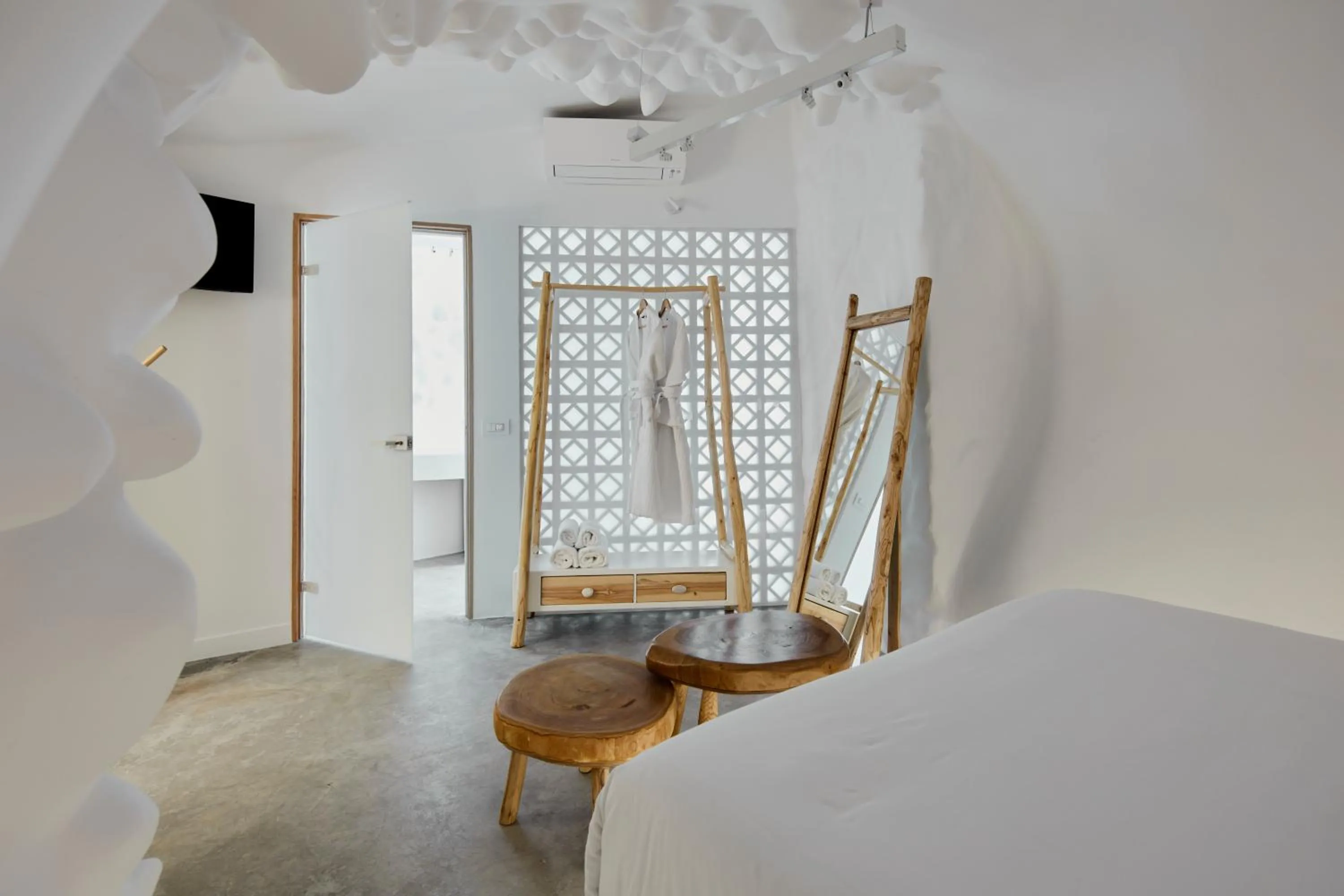 Bed in Theano Cave Suites & Villas